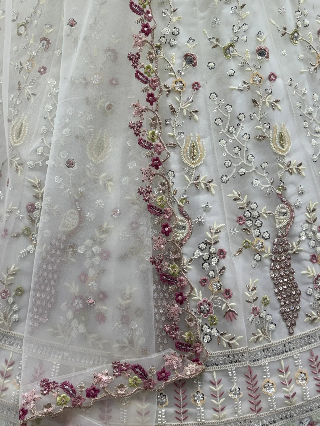Off White Gorgeous Embroidered Net Engagement Wear Lehenga Choli