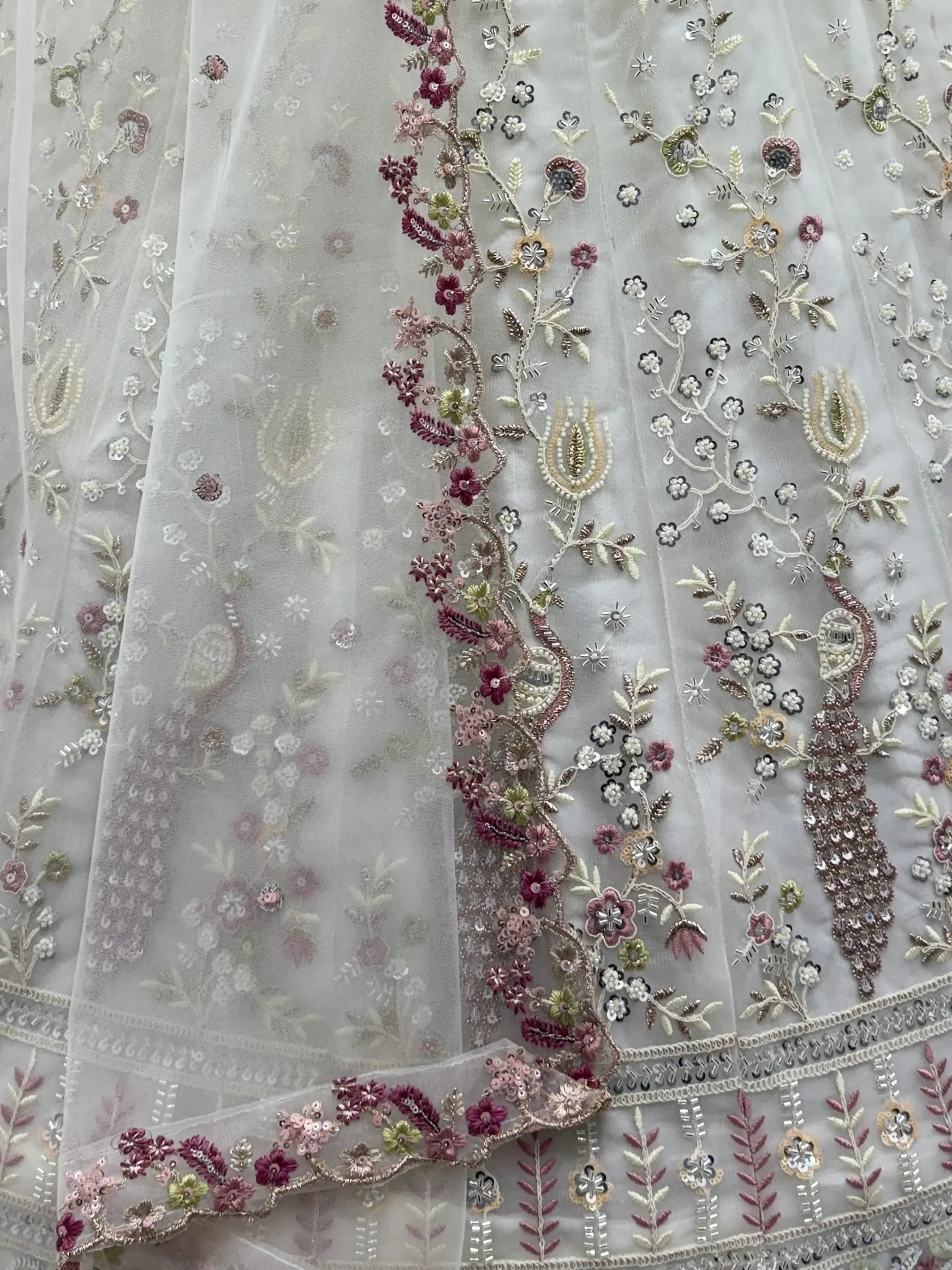 Off White Gorgeous Embroidered Net Engagement Wear Lehenga Choli