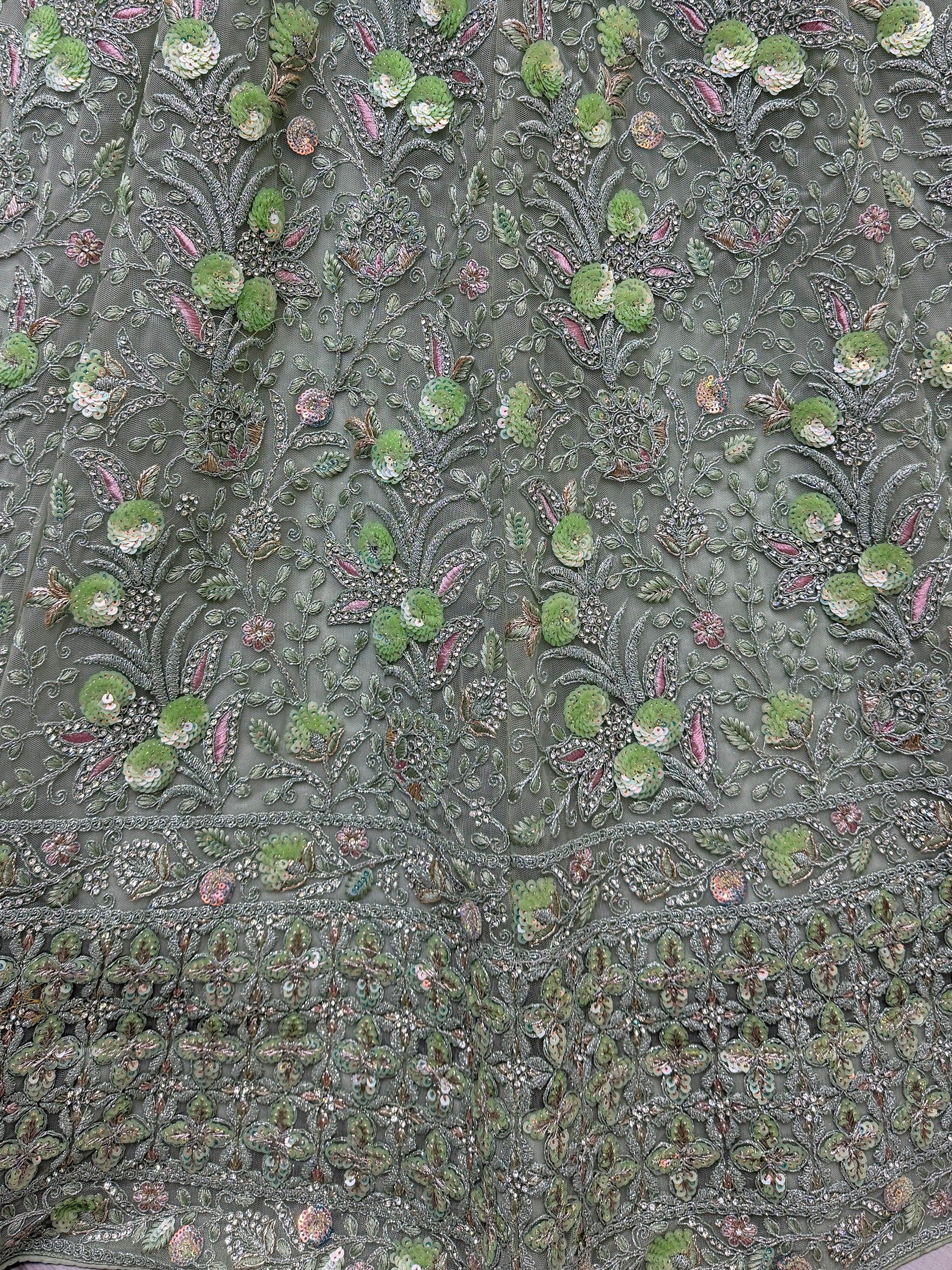Beautiful Sea Green Embroidered Net Reception Wear Lehenga Choli