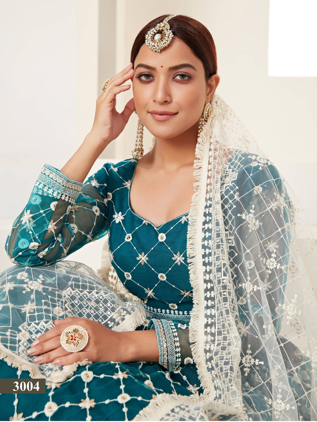 Charming Blue Thread Embroidered Net Festival Wear Lehenga Choli