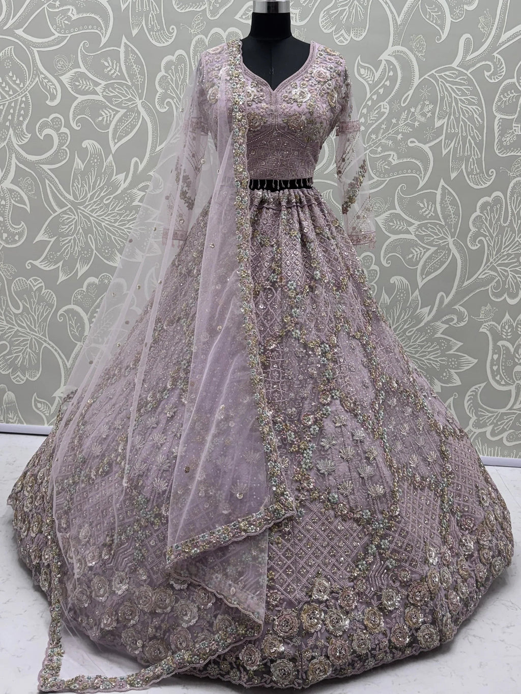 Mauve Notable Multi Thread Work Net Reception Wear Lehenga With Blouse