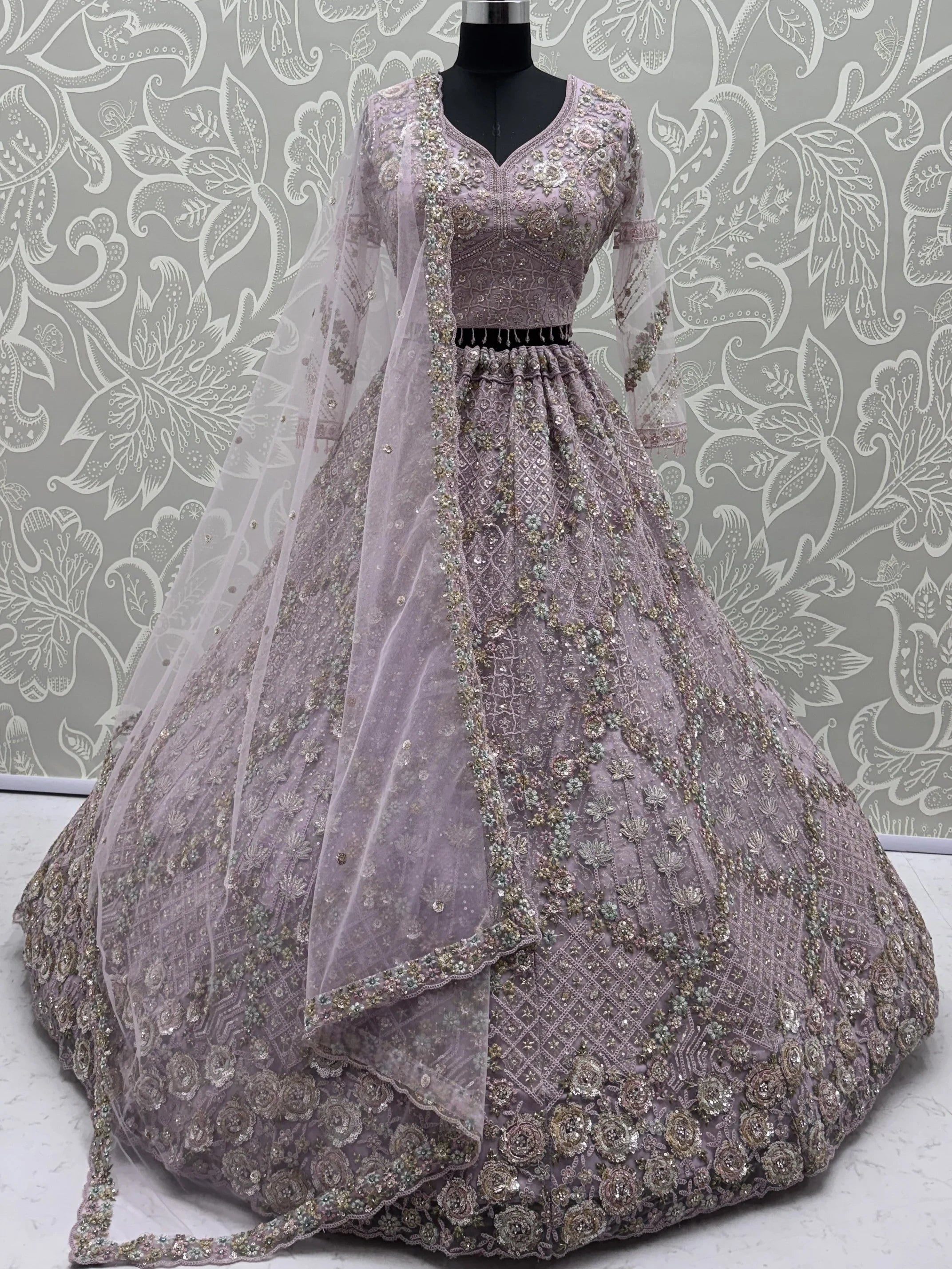 Mauve Notable Multi Thread Work Net Reception Wear Lehenga With Blouse