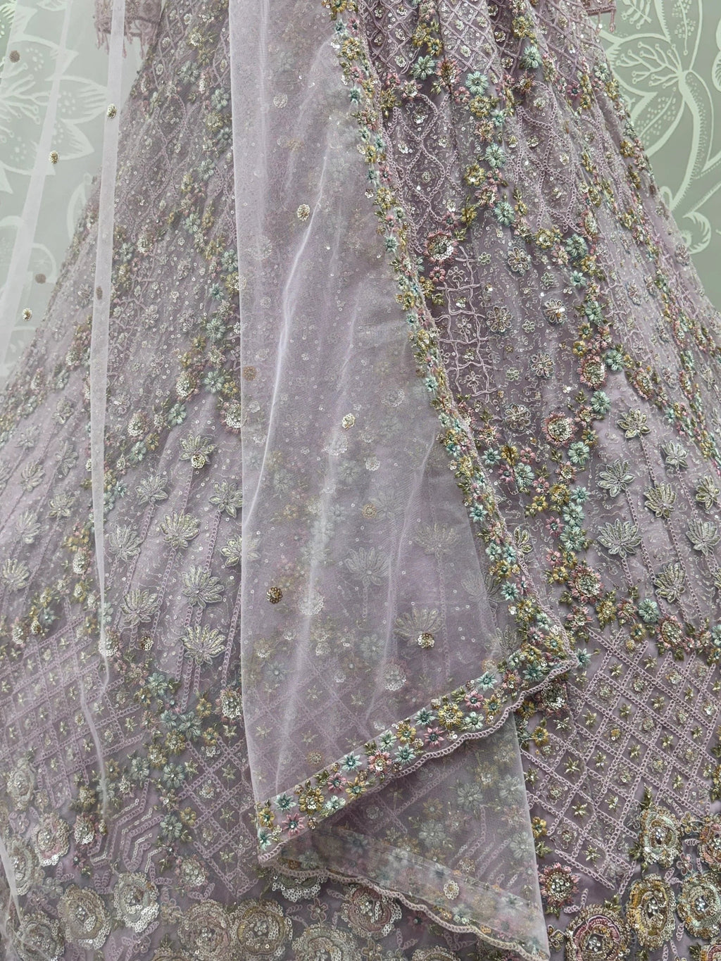 Mauve Notable Multi Thread Work Net Reception Wear Lehenga With Blouse