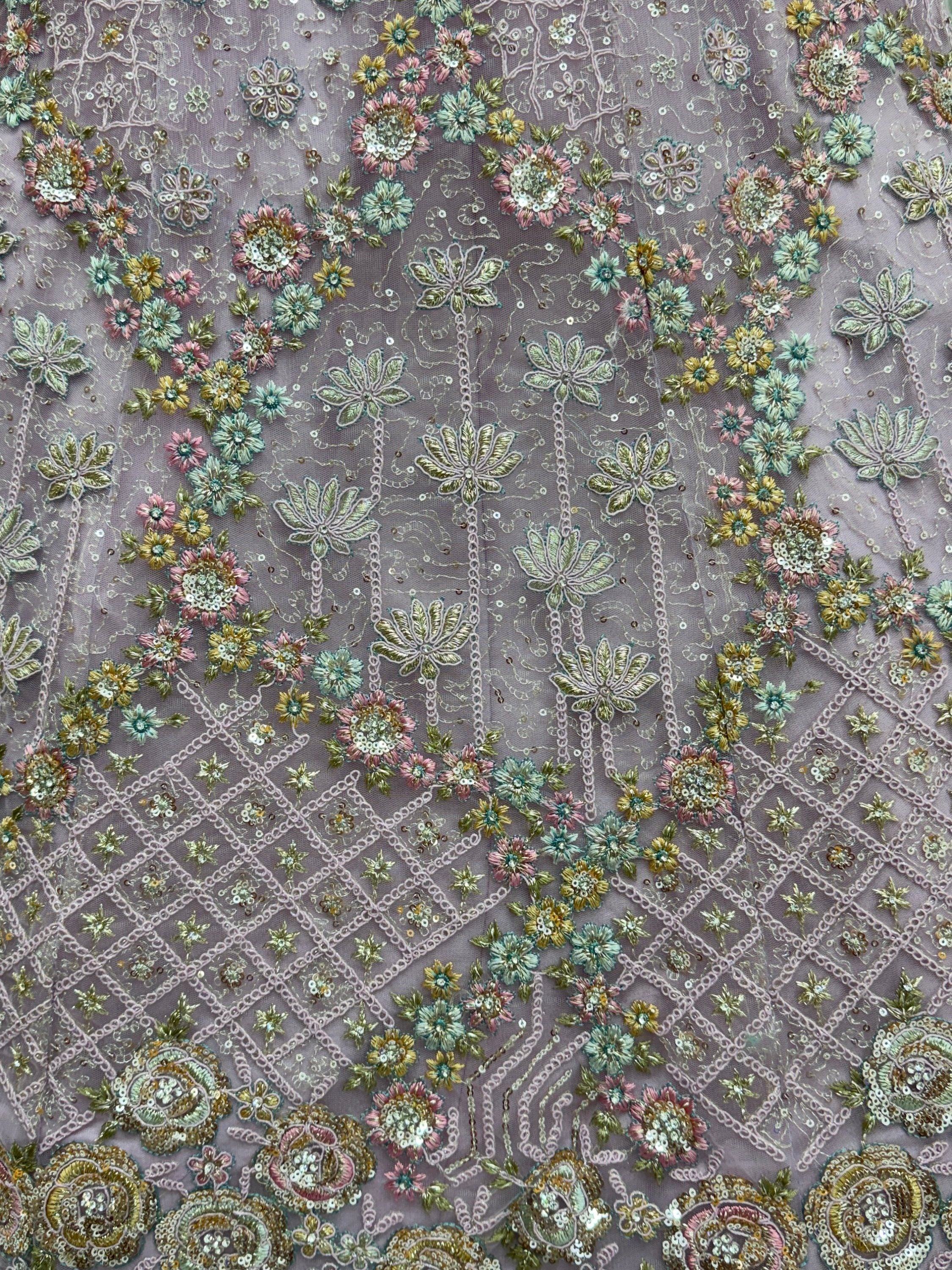 Mauve Notable Multi Thread Work Net Reception Wear Lehenga With Blouse