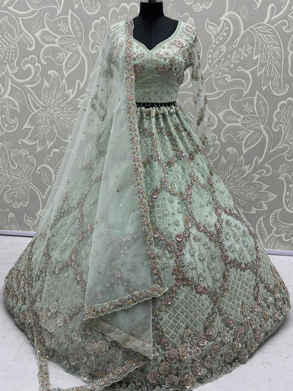 Green Notable Multi Thread Work Net Reception Wear Lehenga With Blouse