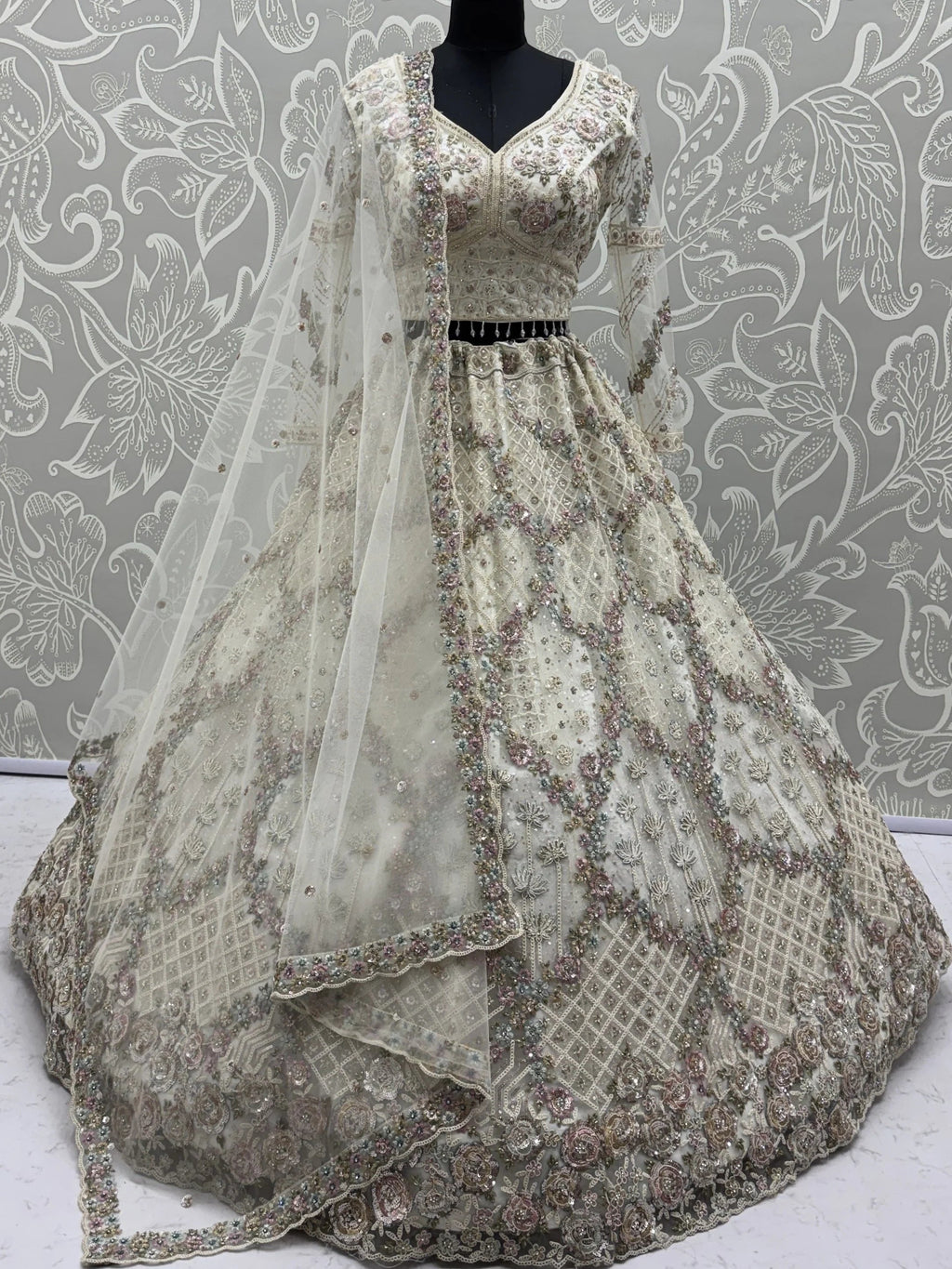 White Notable Multi Thread Work Net Reception Wear Lehenga With Blouse