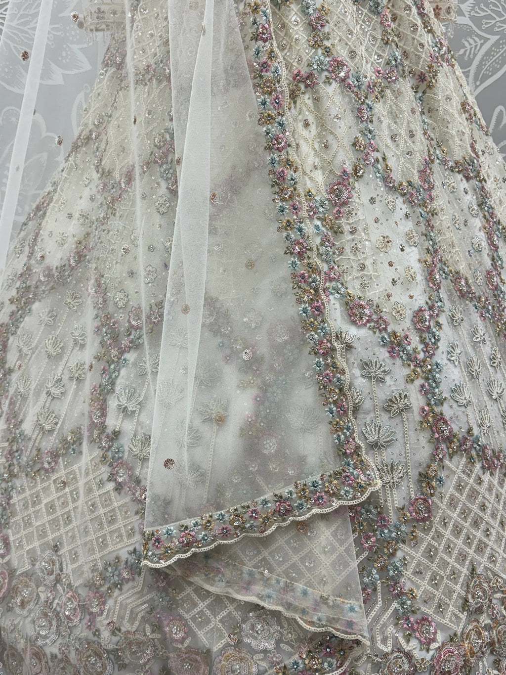 White Notable Multi Thread Work Net Reception Wear Lehenga With Blouse