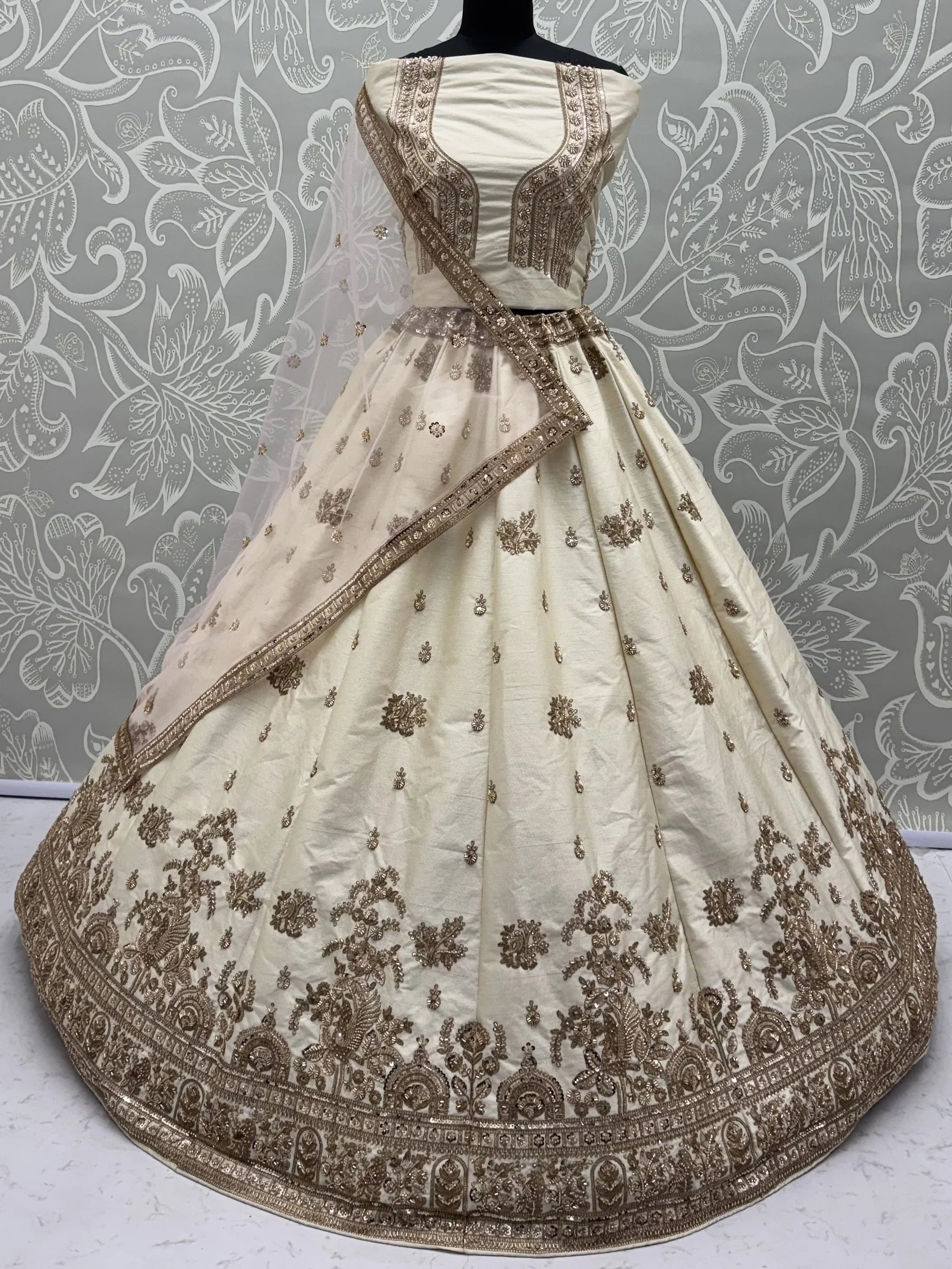 Off White Appealing Bead Work Silk Bridal Lehenga Choli With Double Dupatta