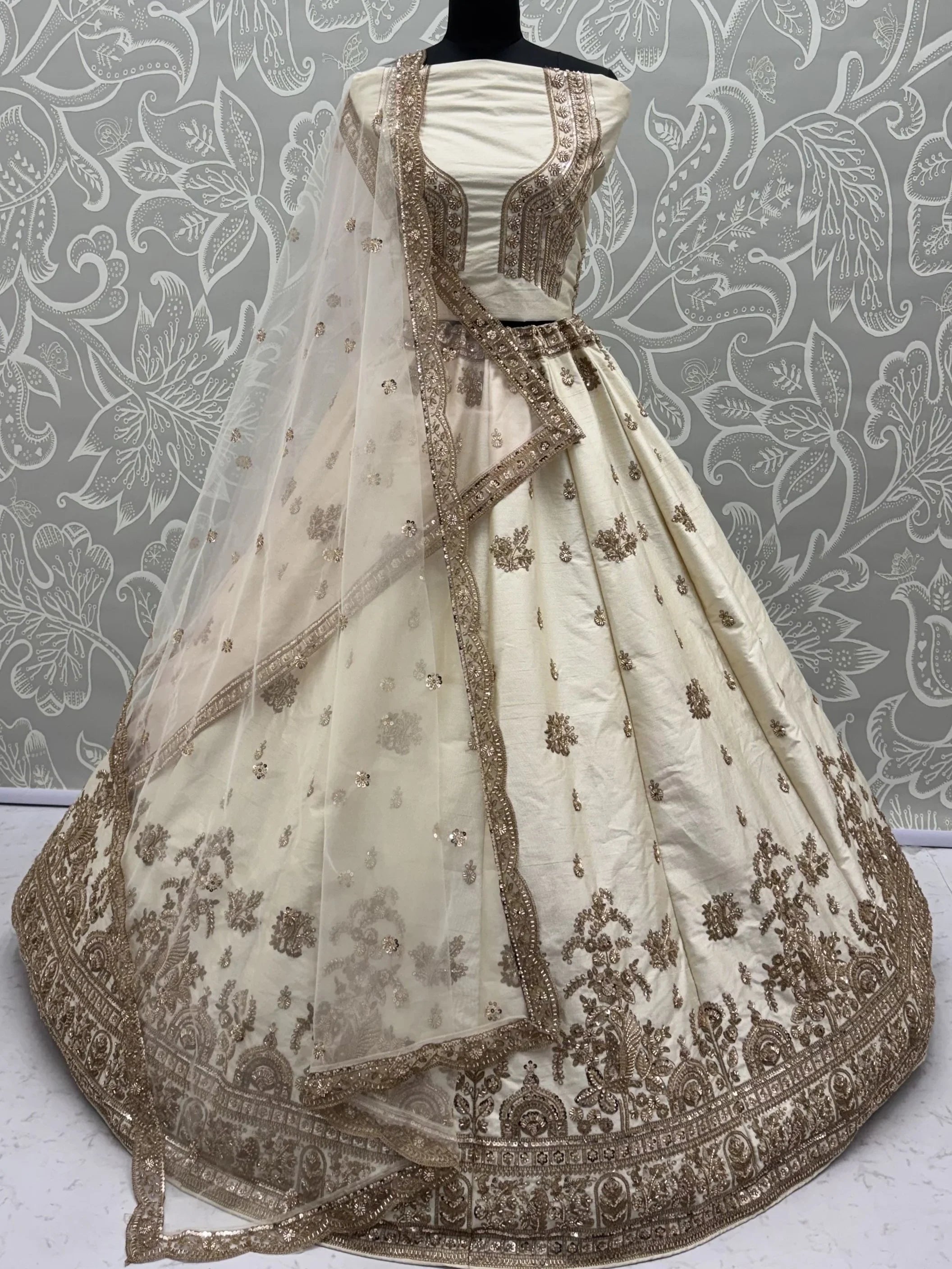 Off White Appealing Bead Work Silk Bridal Lehenga Choli With Double Dupatta