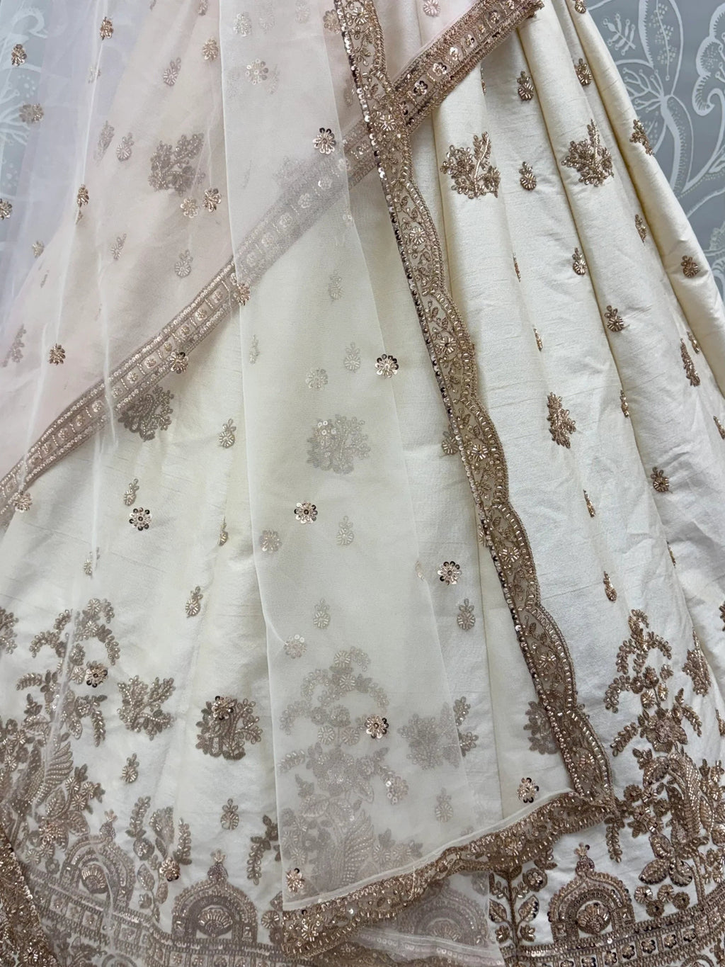 Off White Appealing Bead Work Silk Bridal Lehenga Choli With Double Dupatta