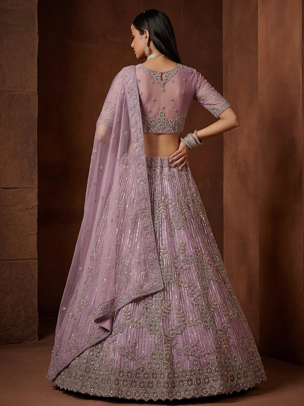 Lavender Breathtaking Zircon Work Net Bridesmaid Lehenga With Blouse