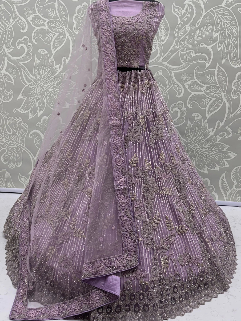 Lavender Breathtaking Zircon Work Net Bridesmaid Lehenga With Blouse