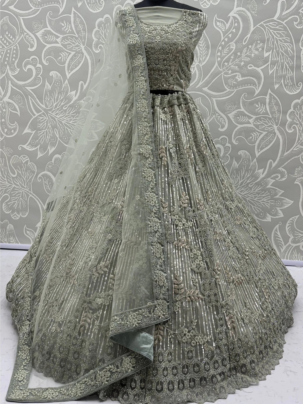 Green Breathtaking Zircon Work Net Bridesmaid Lehenga With Blouse