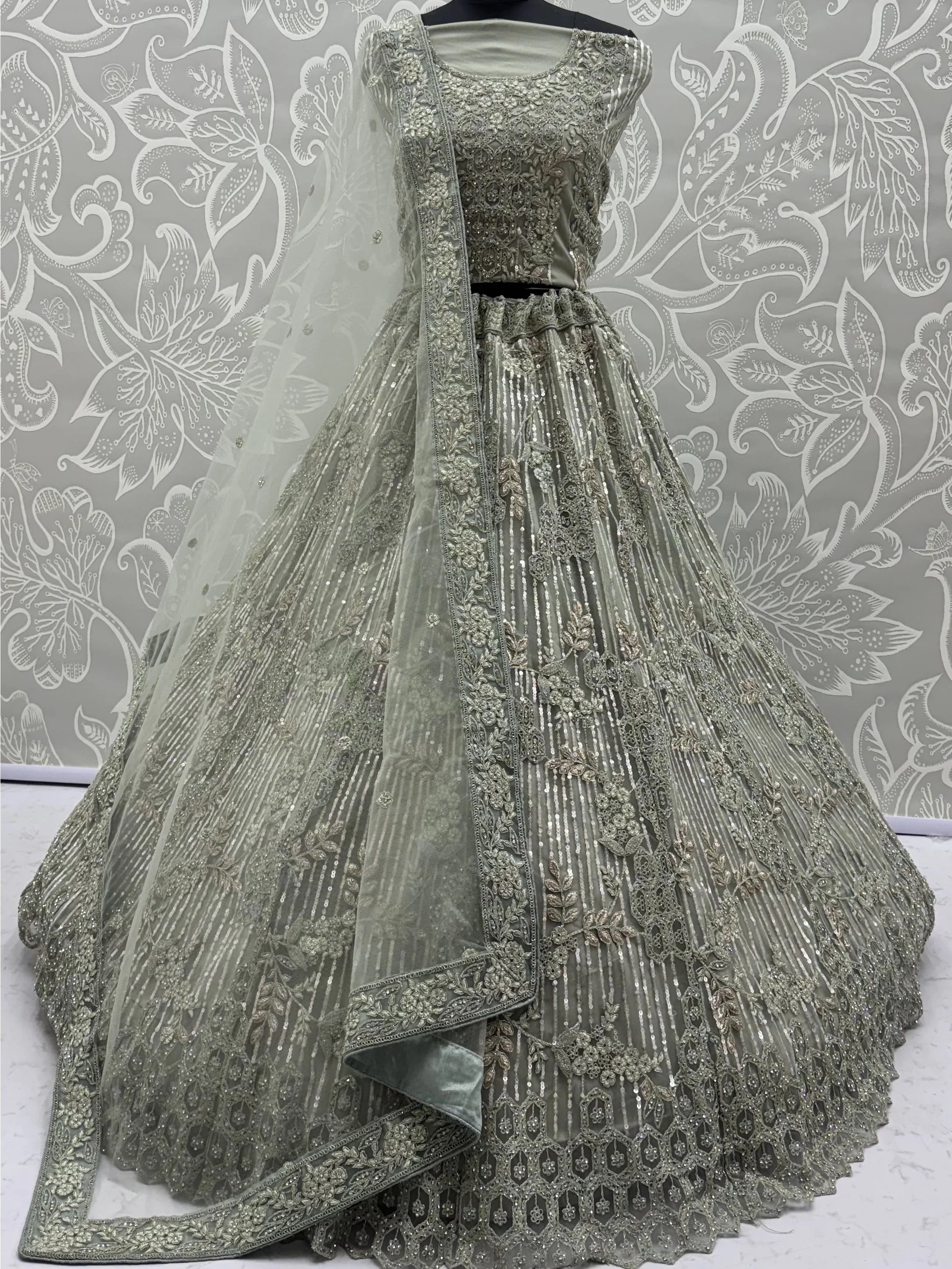 Green Breathtaking Zircon Work Net Bridesmaid Lehenga With Blouse