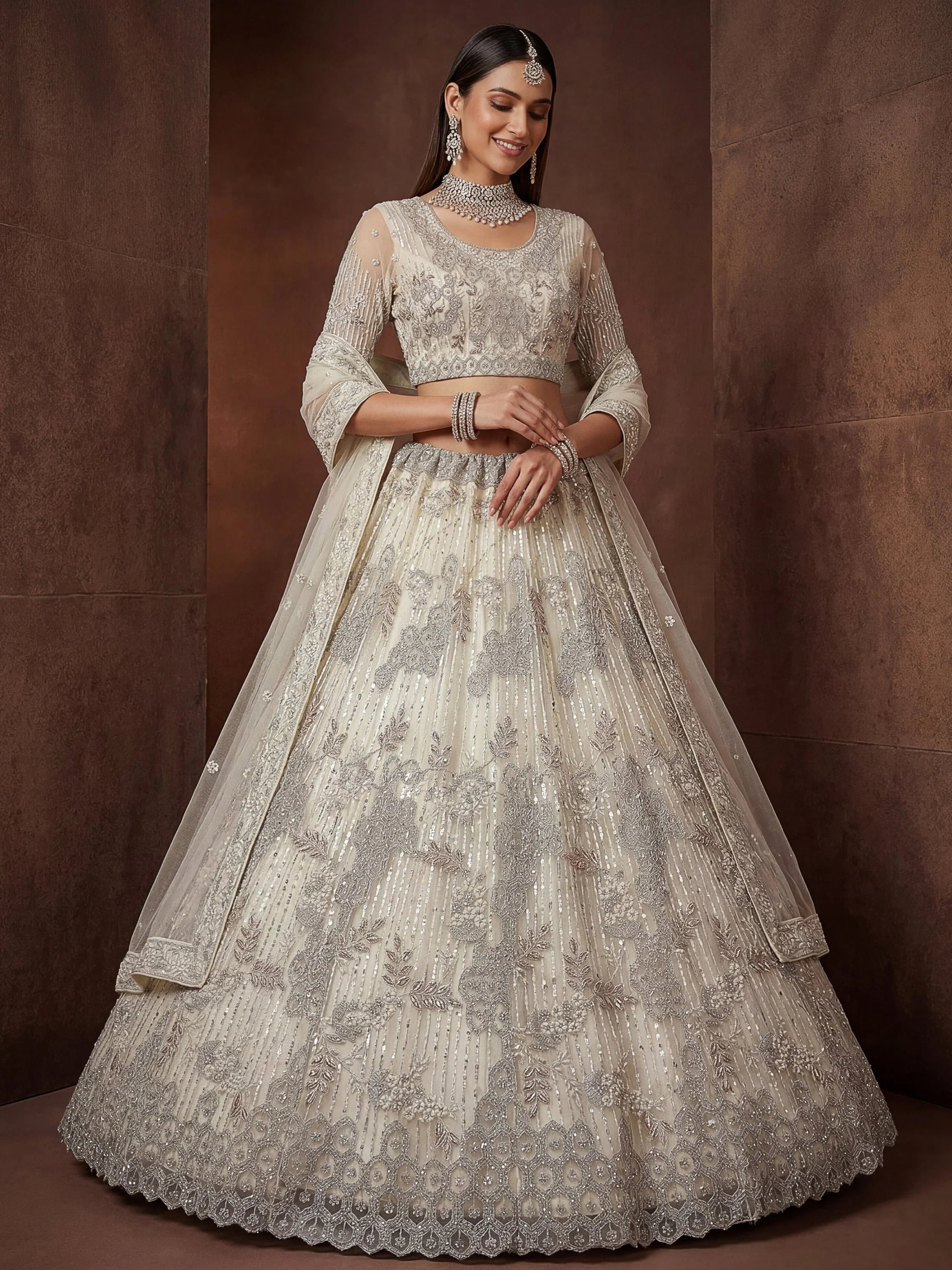 Cream Breathtaking Zircon Work Net Bridesmaid Lehenga With Blouse