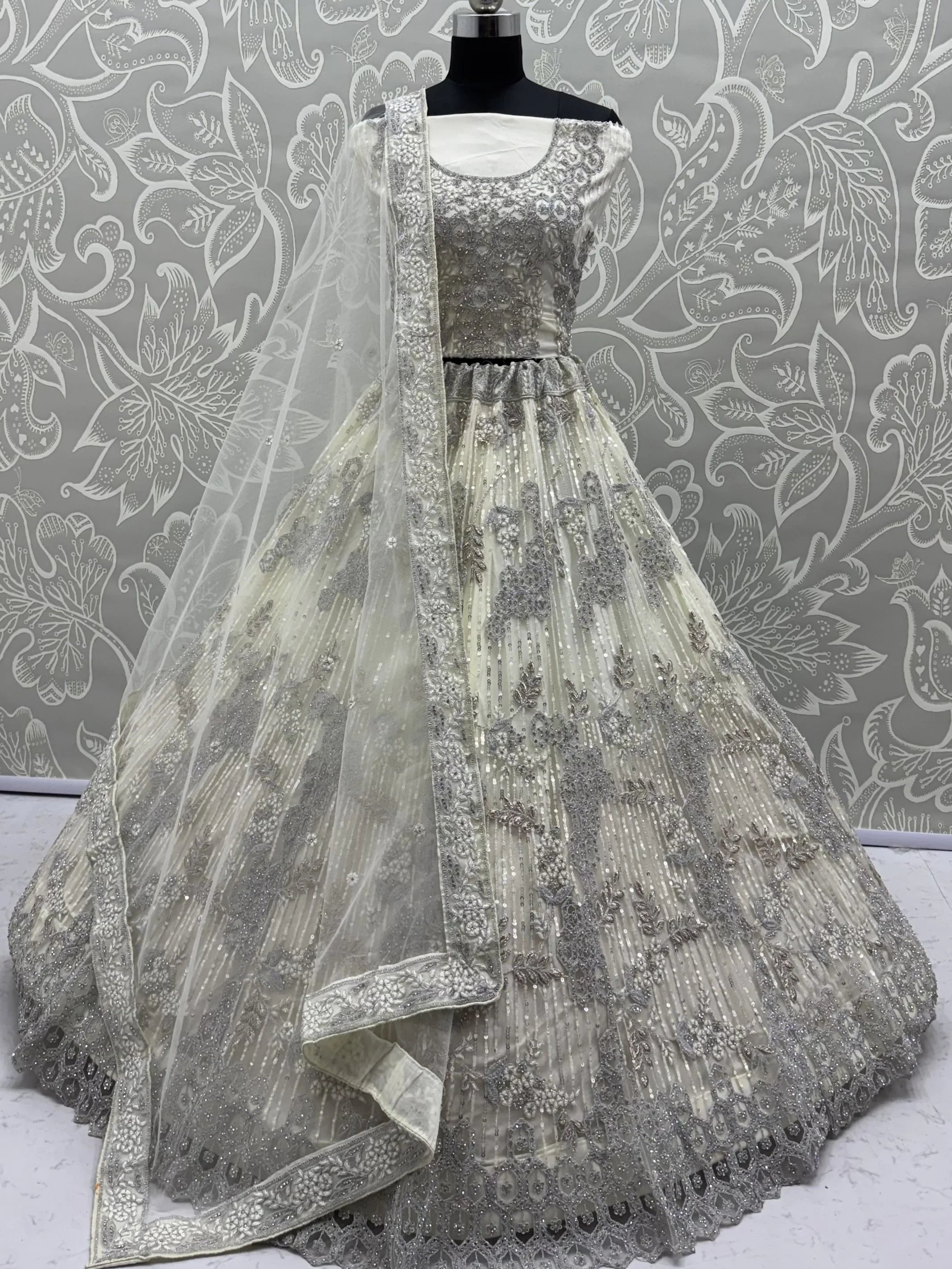 Cream Breathtaking Zircon Work Net Bridesmaid Lehenga With Blouse