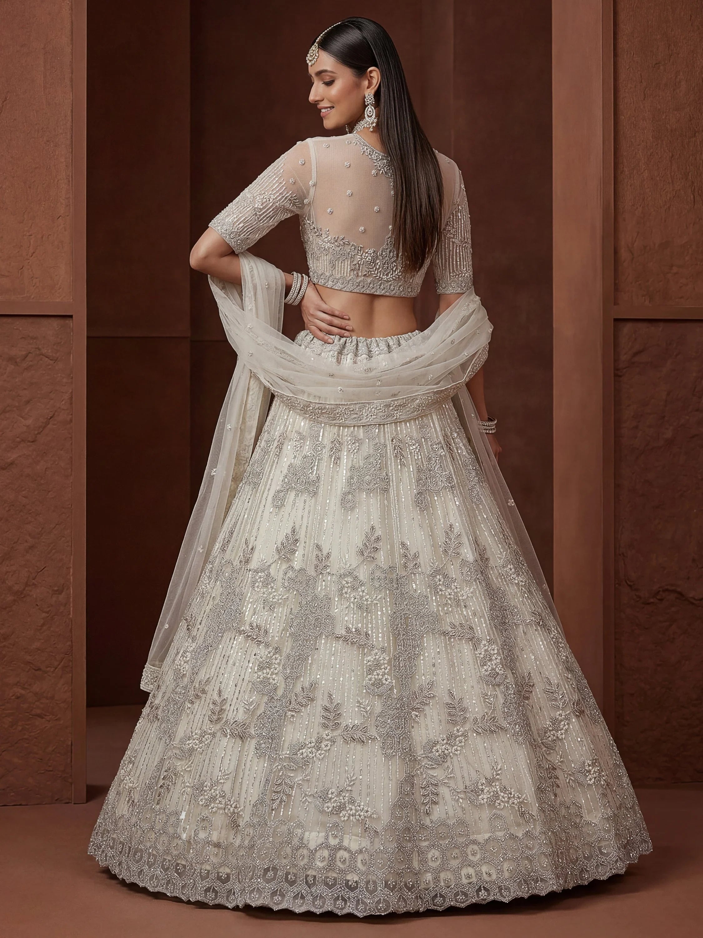 Cream Breathtaking Zircon Work Net Bridesmaid Lehenga With Blouse