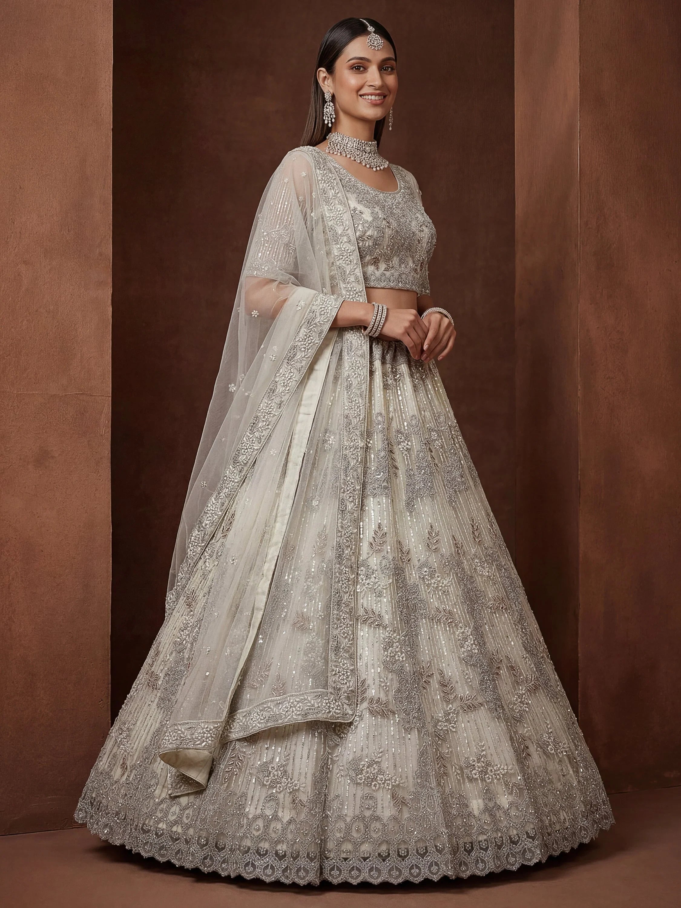 Cream Breathtaking Zircon Work Net Bridesmaid Lehenga With Blouse