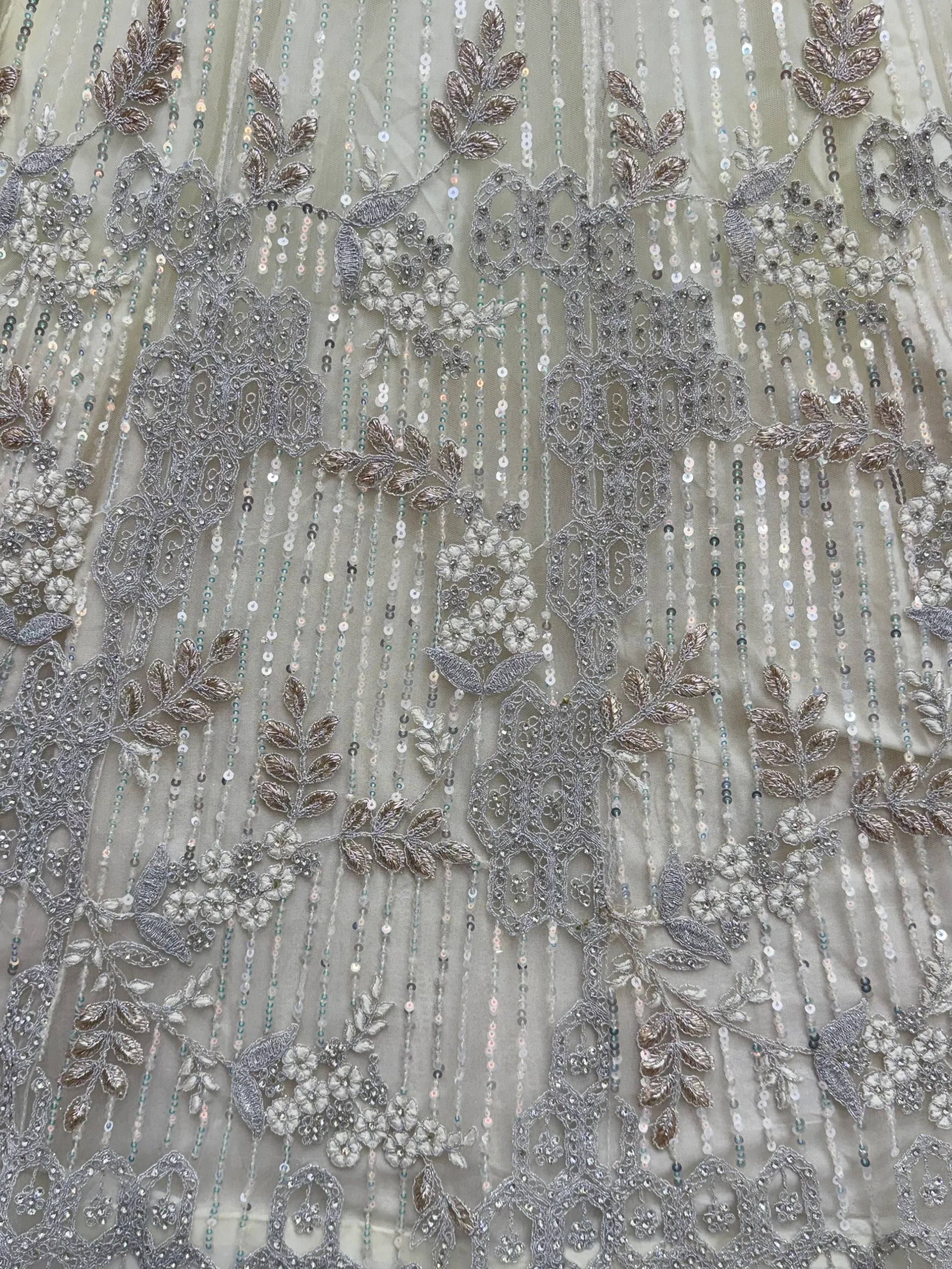 Cream Breathtaking Zircon Work Net Bridesmaid Lehenga With Blouse