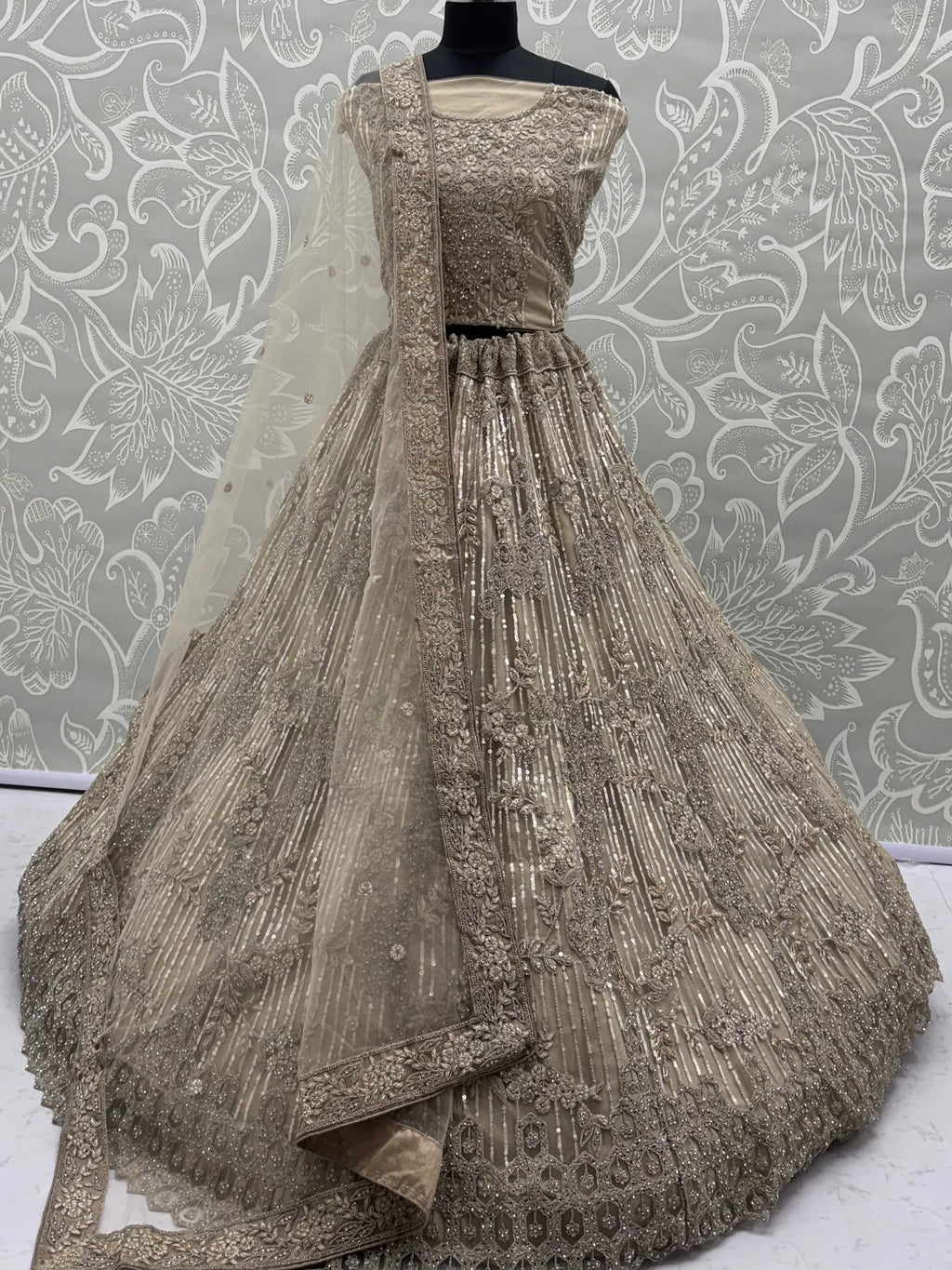 Beige Breathtaking Zircon Work Net Bridesmaid Lehenga With Blouse
