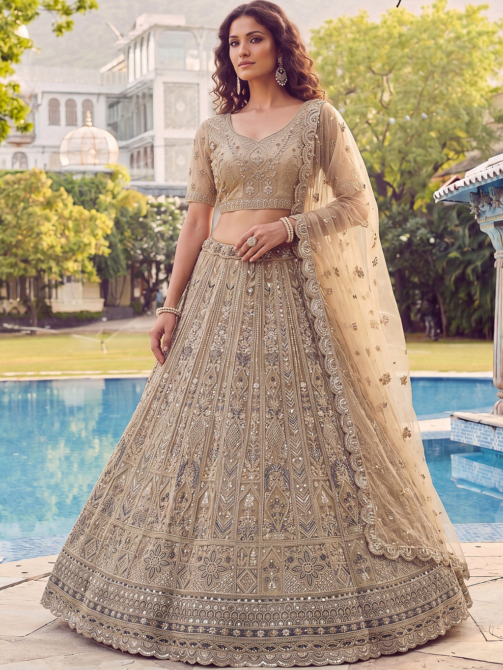 Beige Shiny Embroidered Net Reception Wear Lehenga Choli With Dupatta