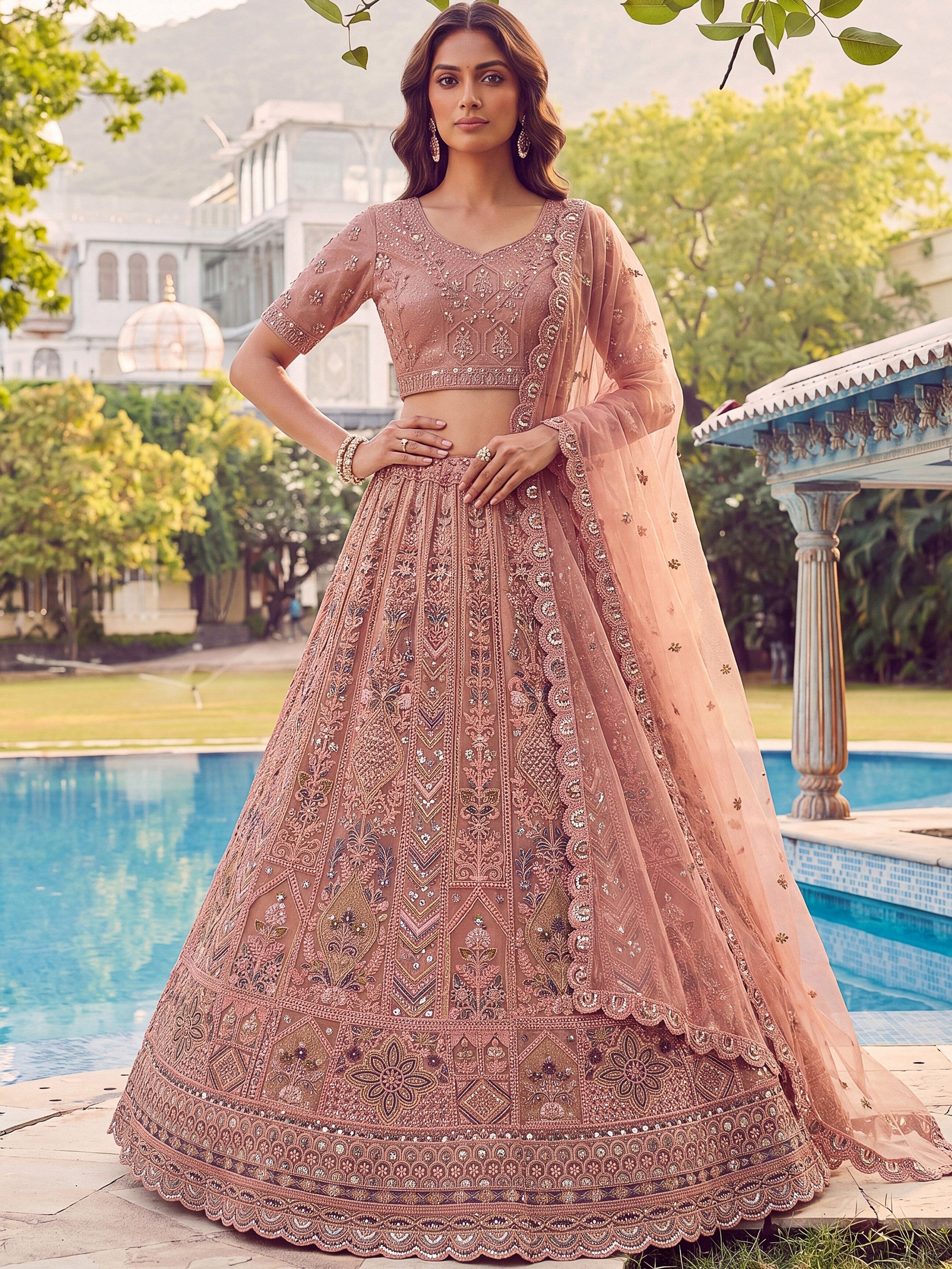 Peach Shiny Embroidered Net Reception Wear Lehenga Choli With Dupatta