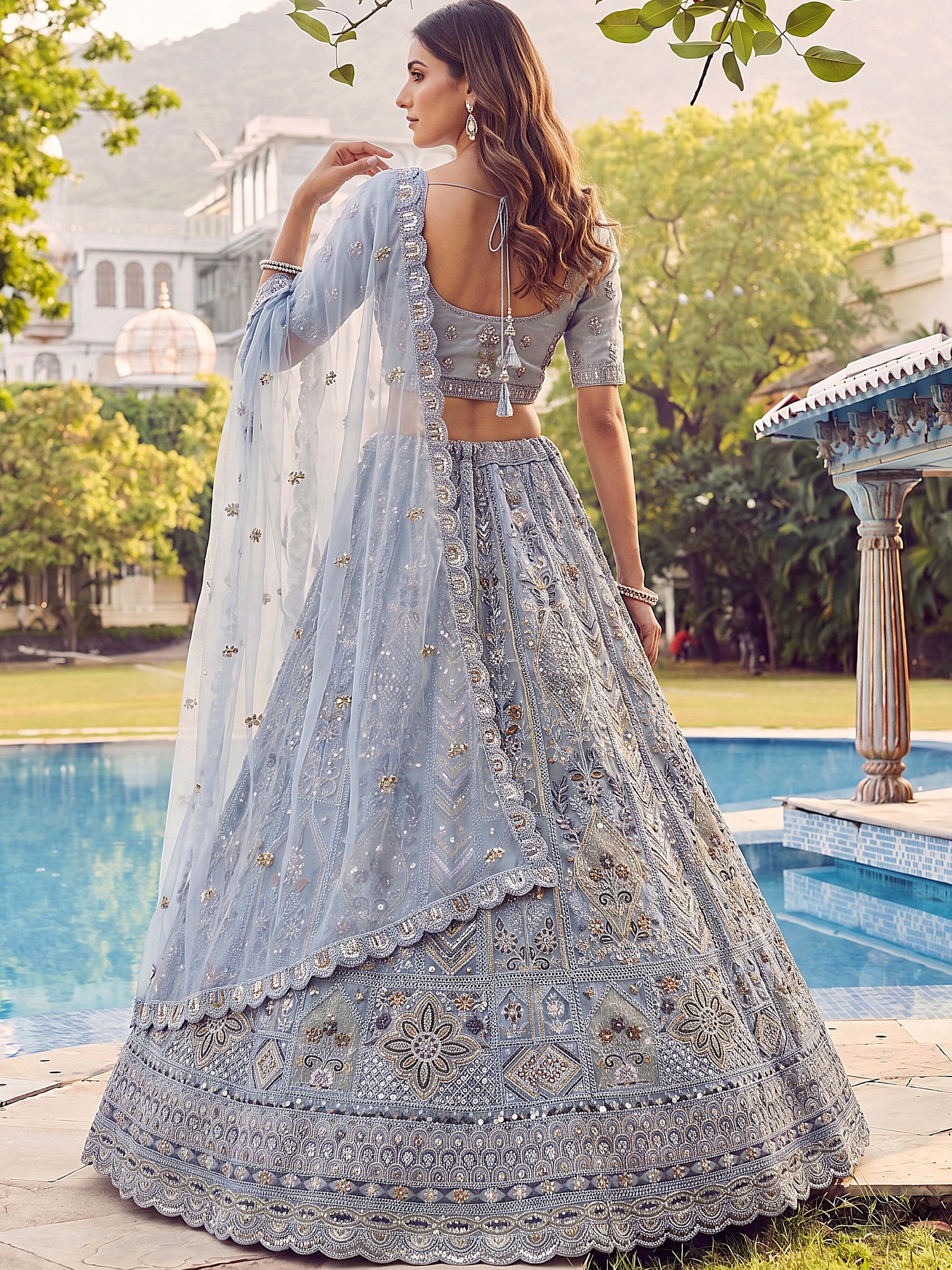 Blue Shiny Embroidered Net Reception Wear Lehenga Choli With Dupatta