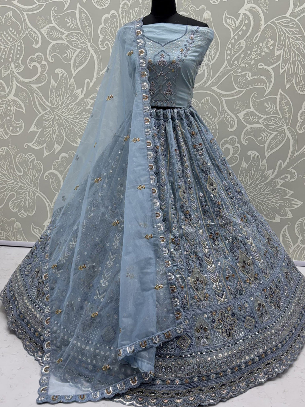 Blue Shiny Embroidered Net Reception Wear Lehenga Choli With Dupatta