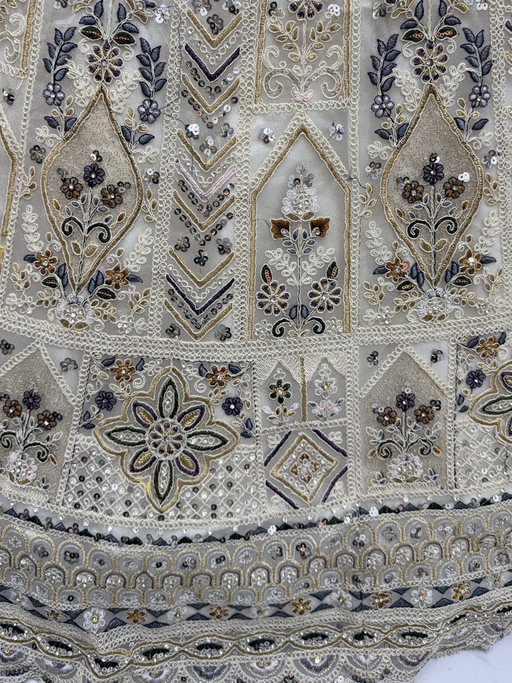 Cream Shiny Embroidered Net Reception Wear Lehenga Choli With Dupatta