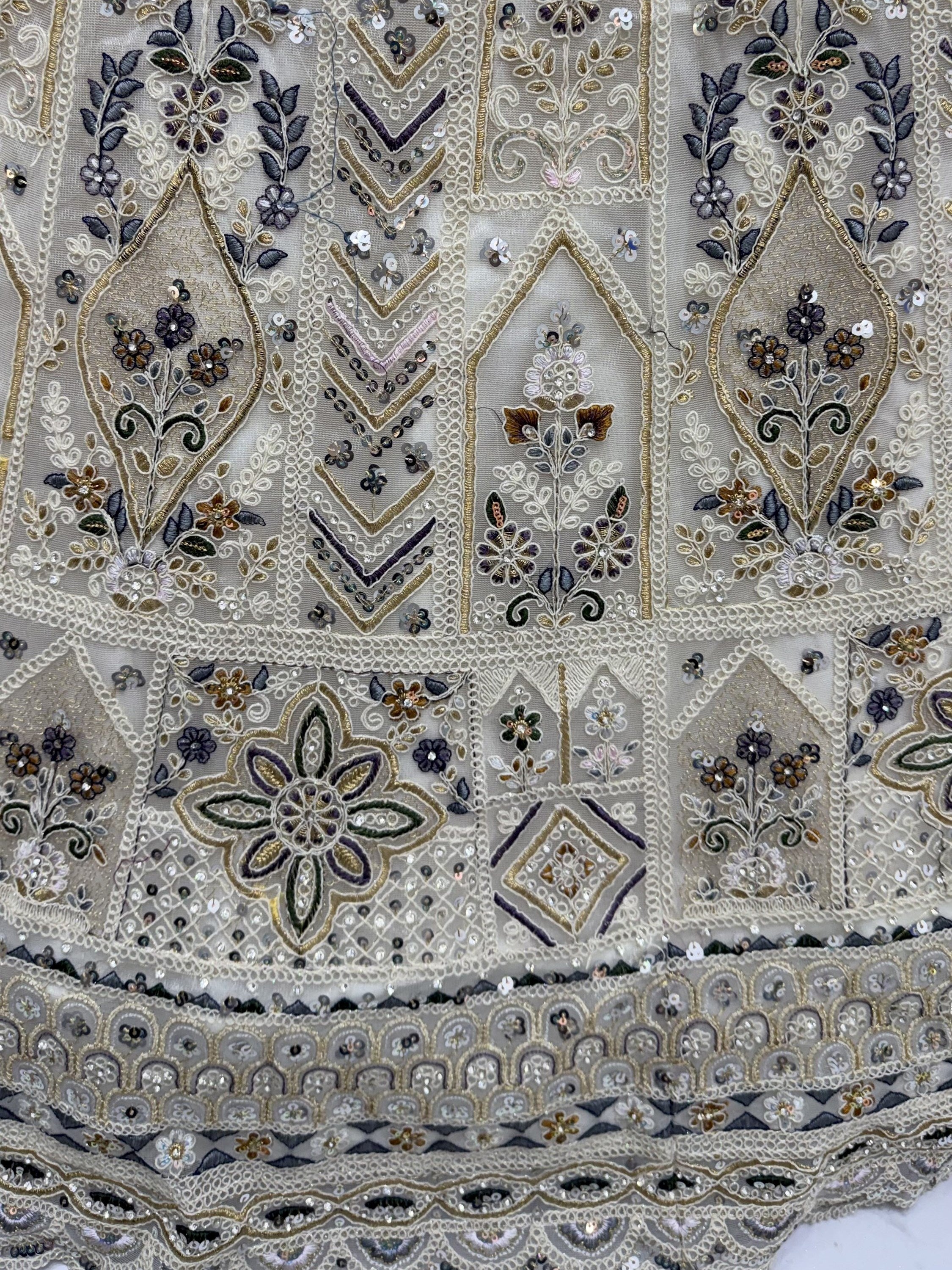 Cream Shiny Embroidered Net Reception Wear Lehenga Choli With Dupatta