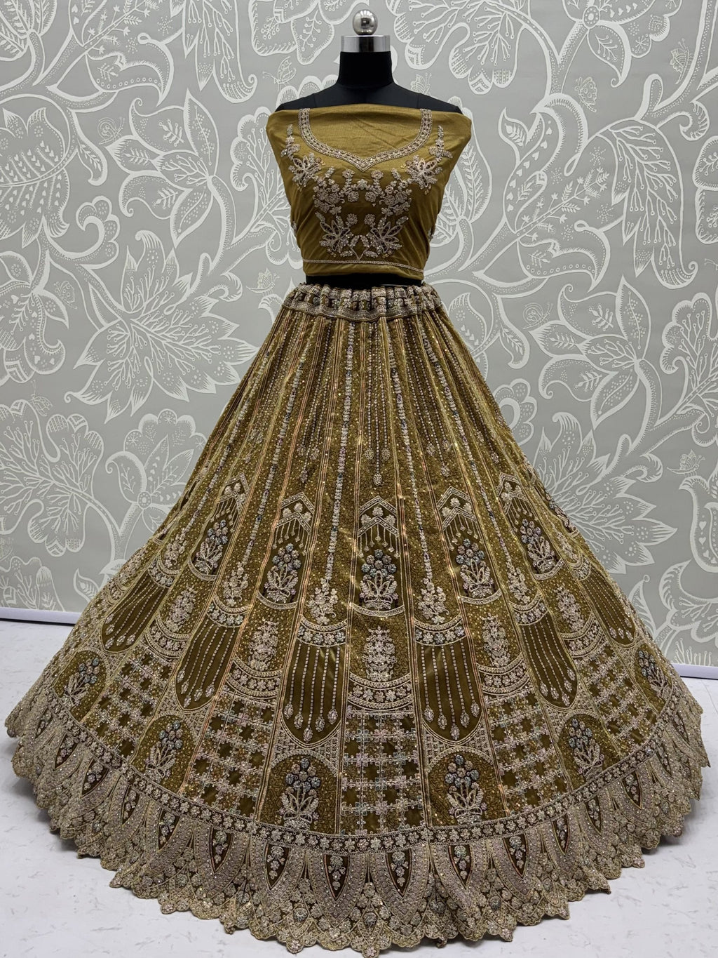 Dazzling Golden Multi Thread Work Net Reception Wear Lehenga Choli
