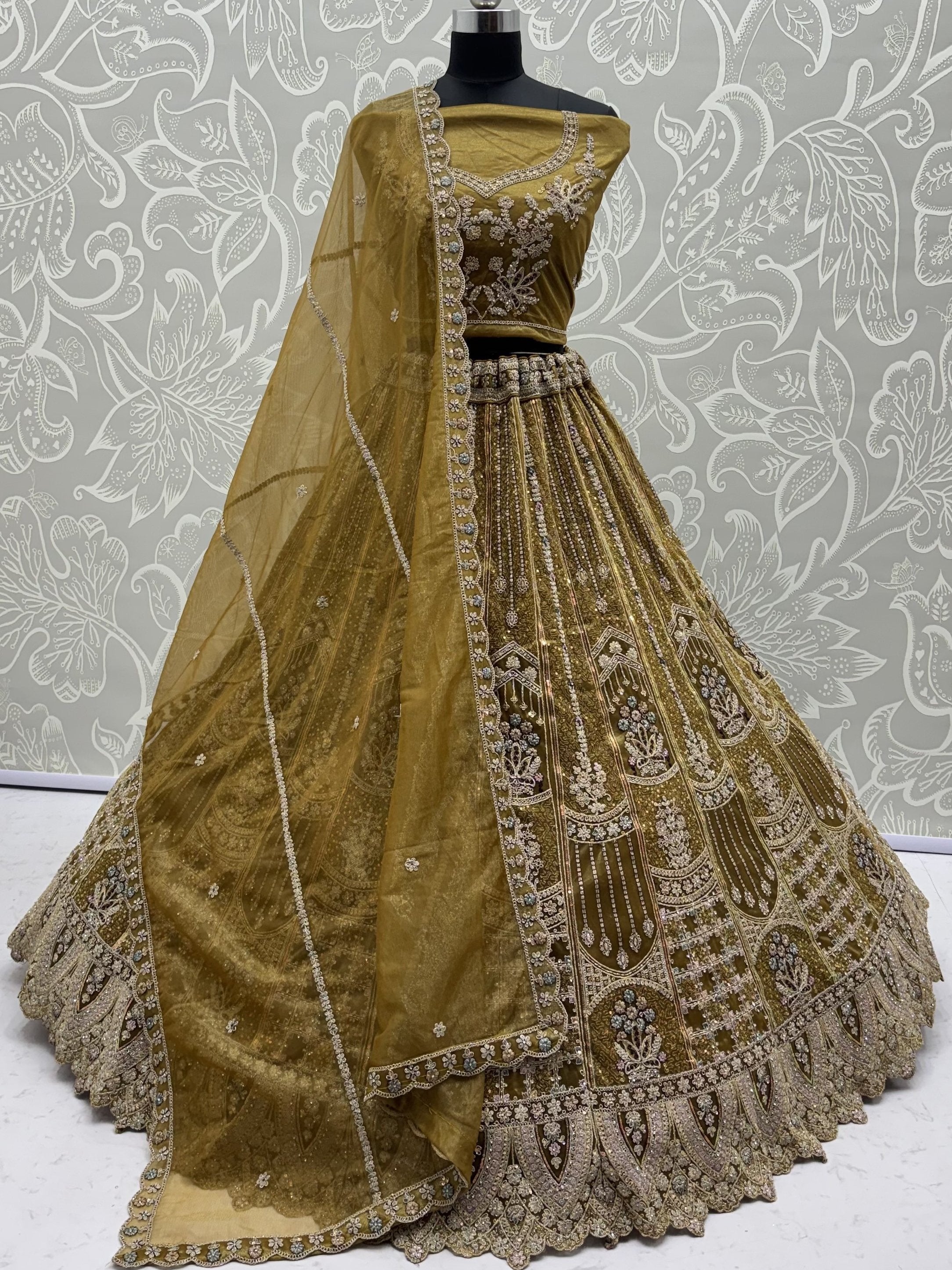 Dazzling Golden Multi Thread Work Net Reception Wear Lehenga Choli