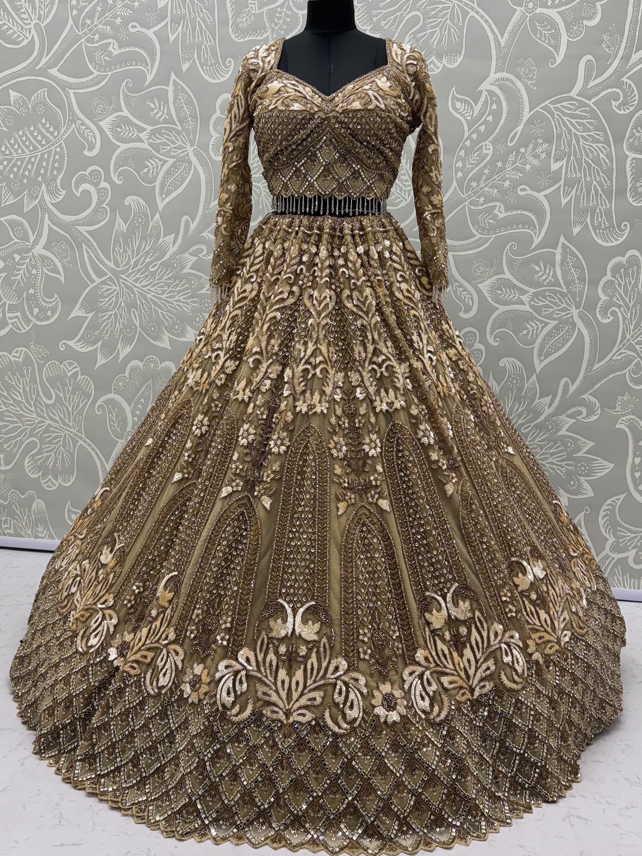 Luxurious Golden Hand Embroidery Net Bridal Lehenga Choli With Dupatta