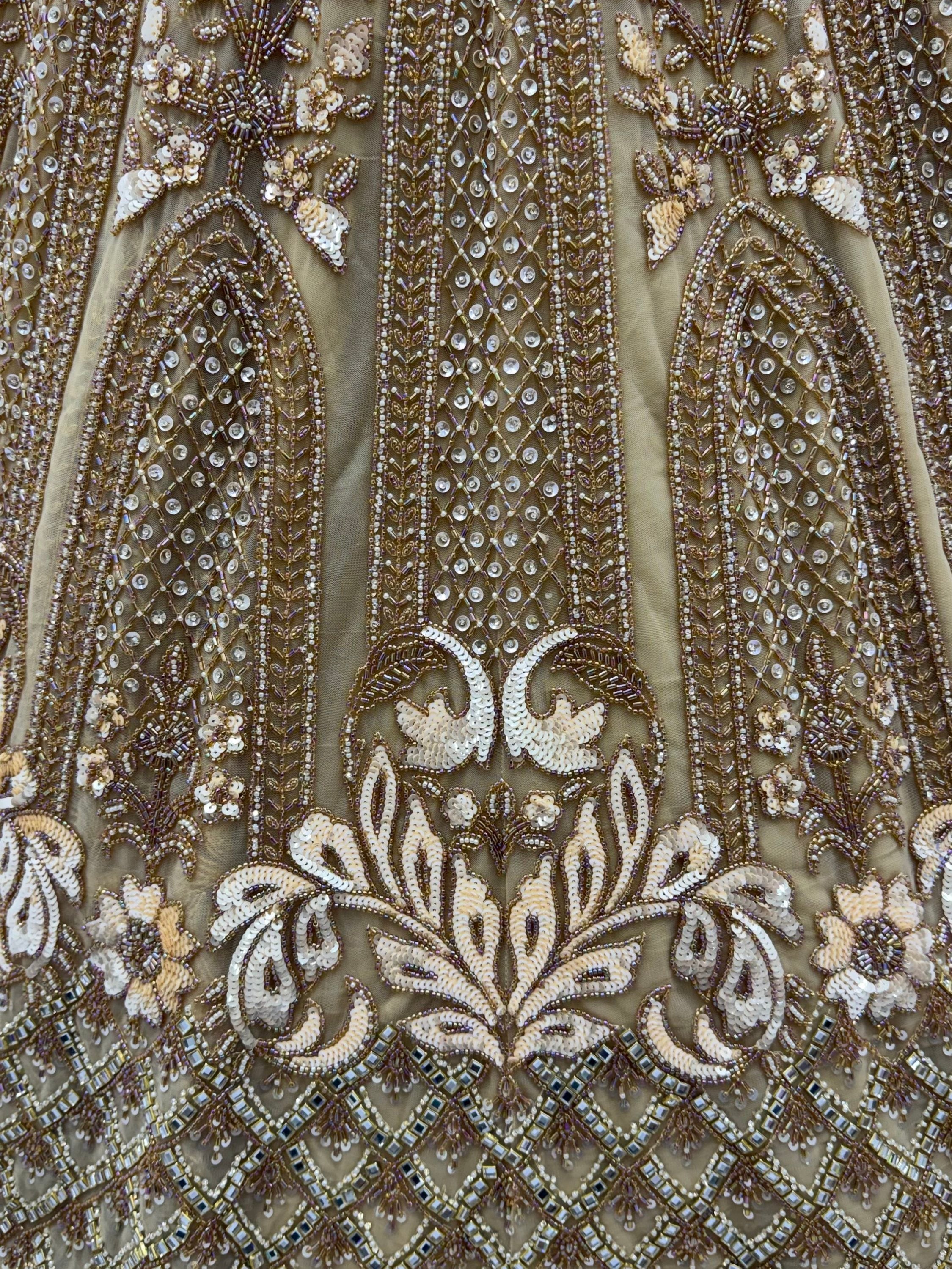 Luxurious Golden Hand Embroidery Net Bridal Lehenga Choli With Dupatta
