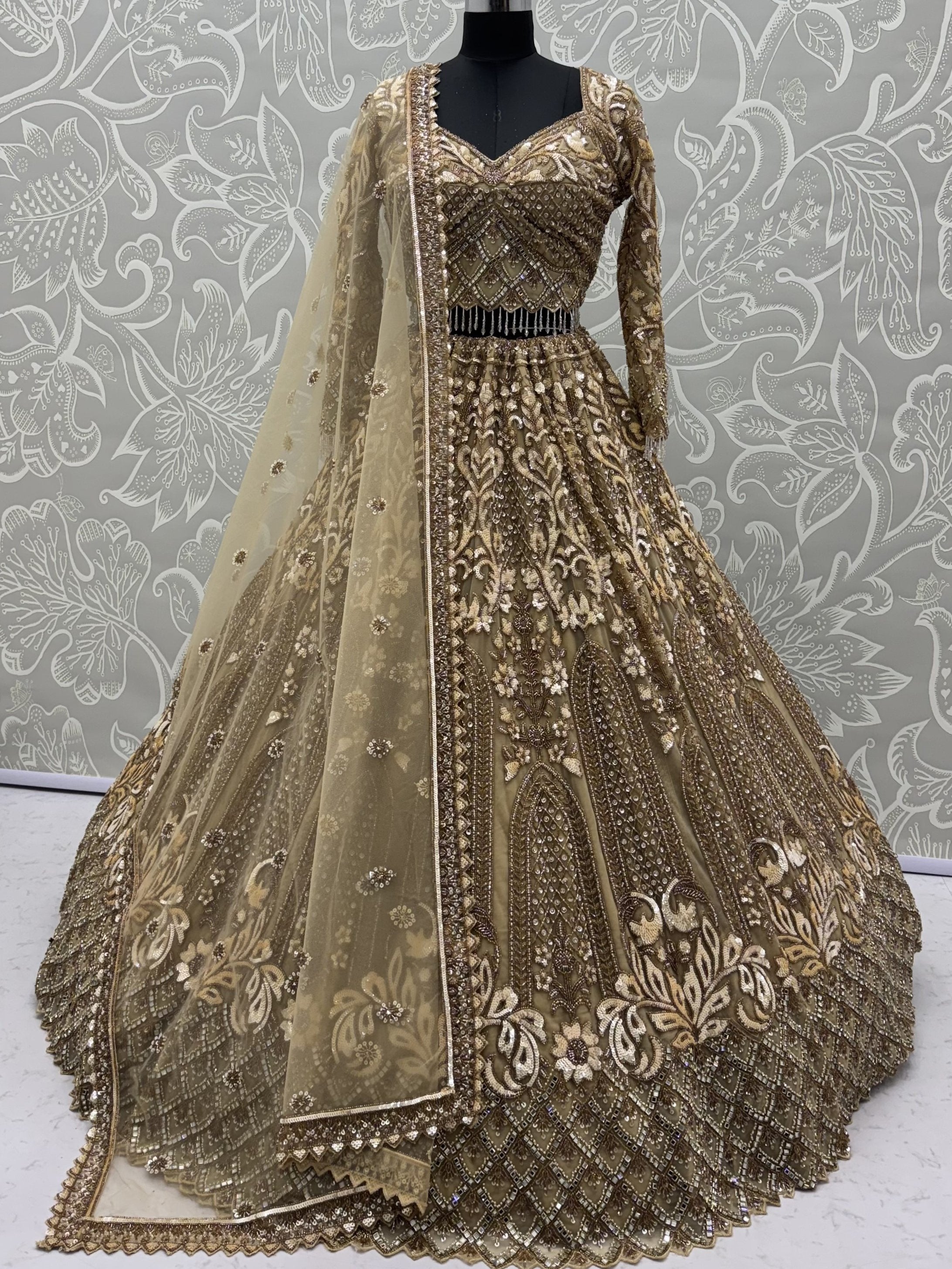 Luxurious Golden Hand Embroidery Net Bridal Lehenga Choli With Dupatta