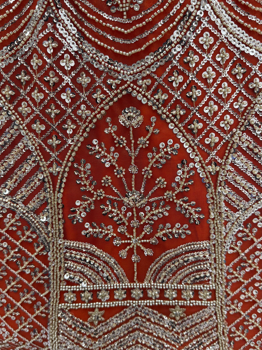 Wonderful Rust Orange Sequins Net Wedding Wear Lehenga Choli