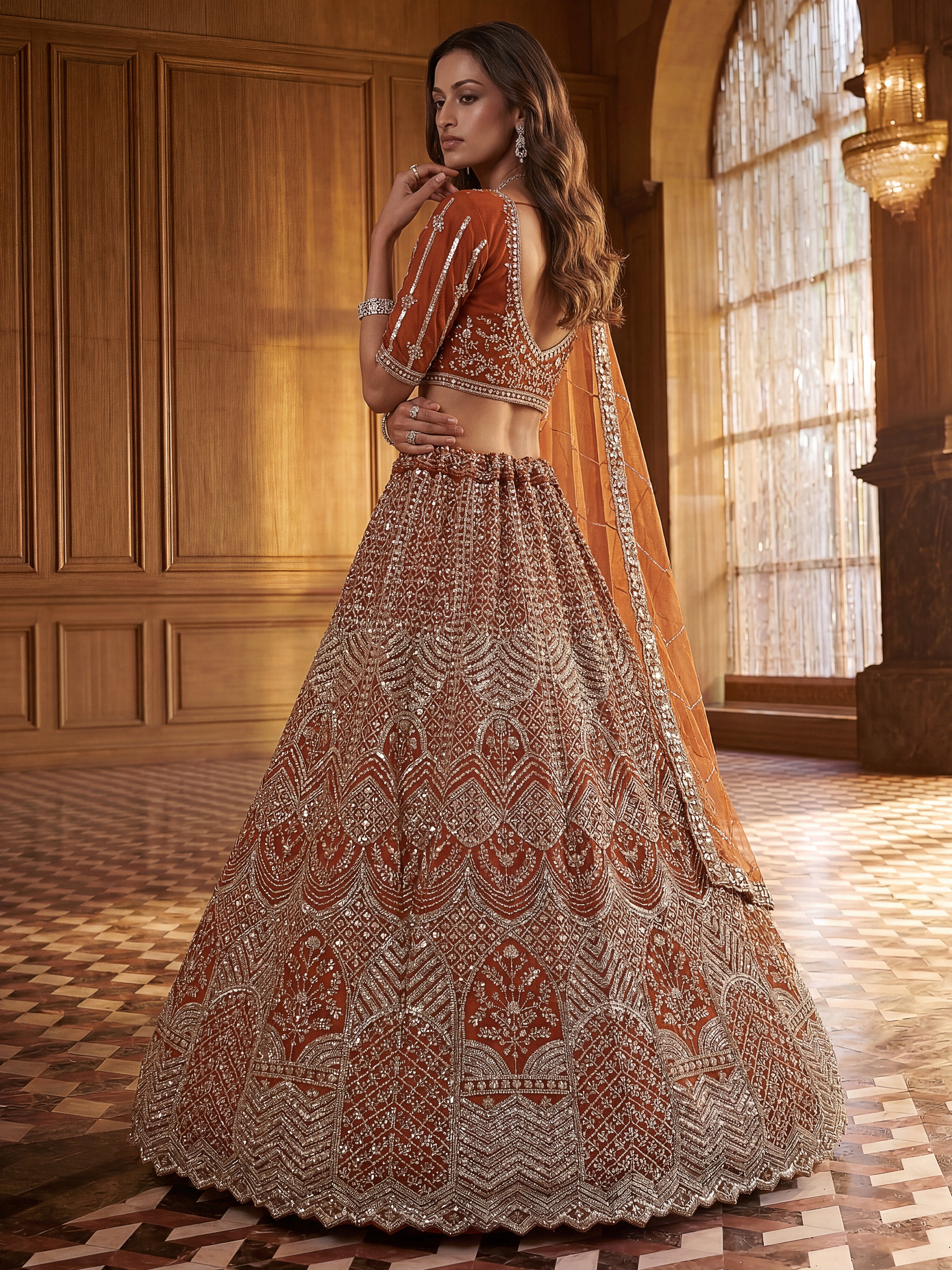 Wonderful Rust Orange Sequins Net Wedding Wear Lehenga Choli