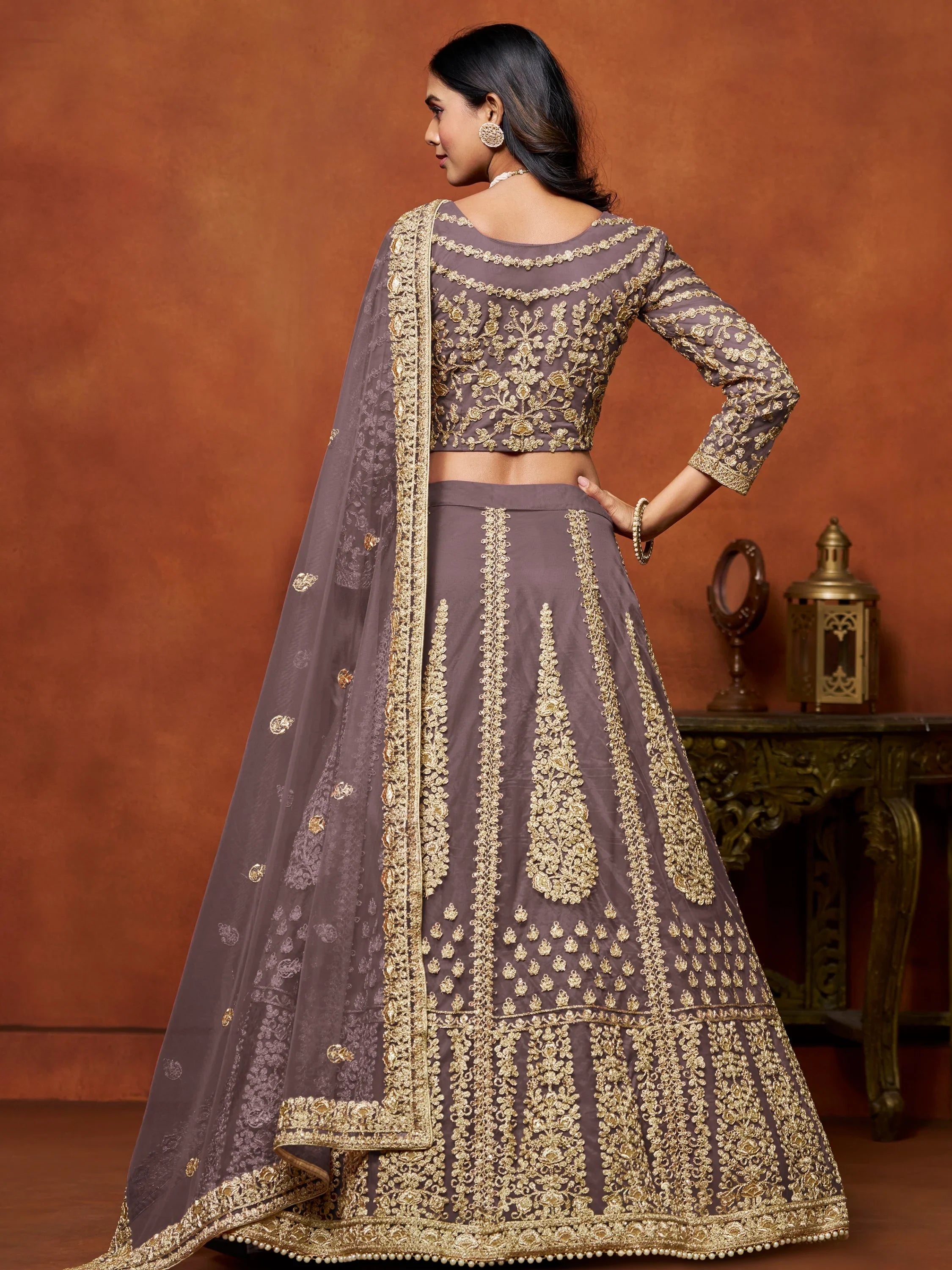 Beautiful Lavender Zari Work Net Reception Wear Lehenga Choli