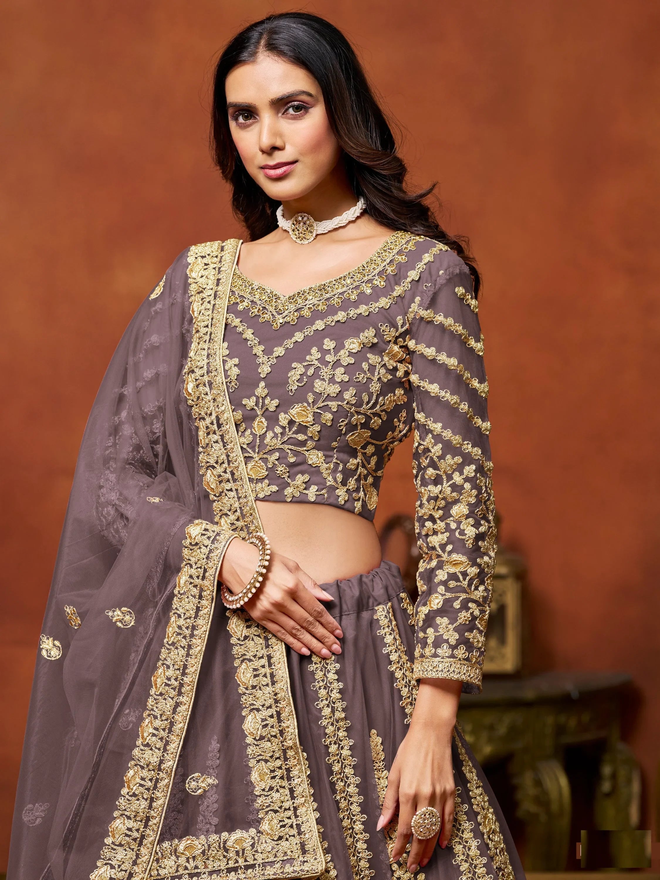 Beautiful Lavender Zari Work Net Reception Wear Lehenga Choli