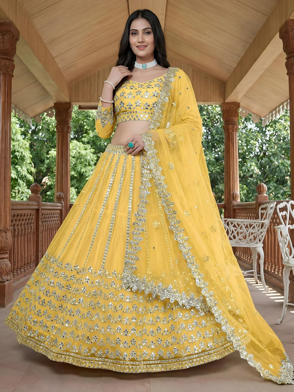Captivating Yellow Foil Work Net Sangeet Wear Lehenga Choli