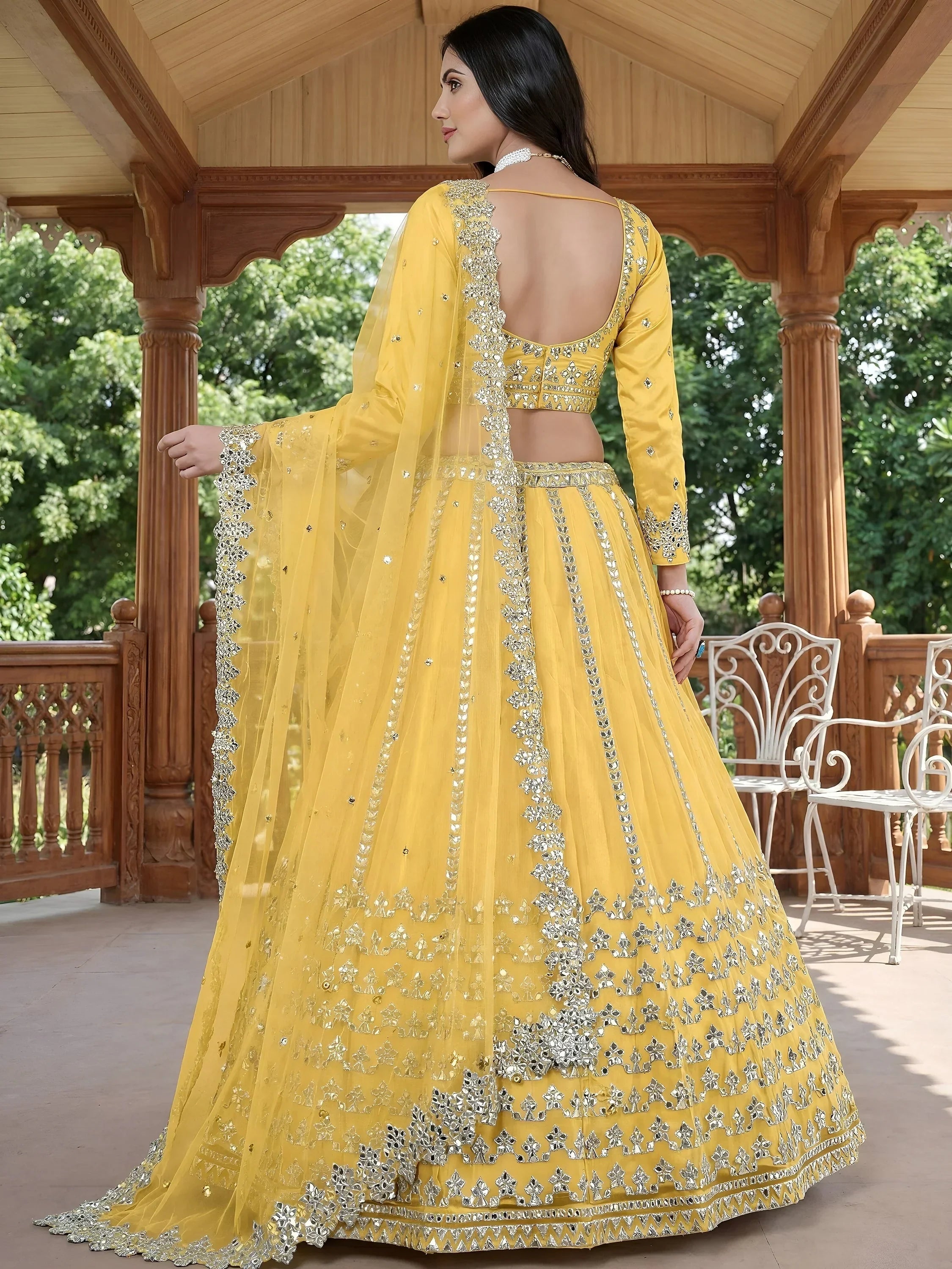 Captivating Yellow Foil Work Net Sangeet Wear Lehenga Choli