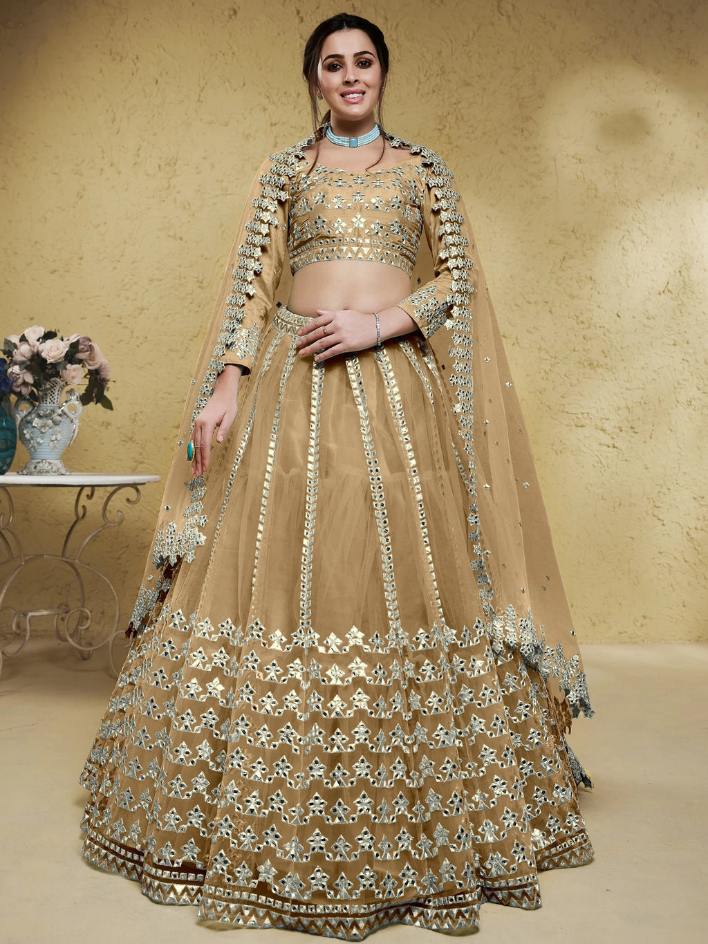 Beige Stunning Foil Work Net Wedding Lehenga Choli With Dupatta