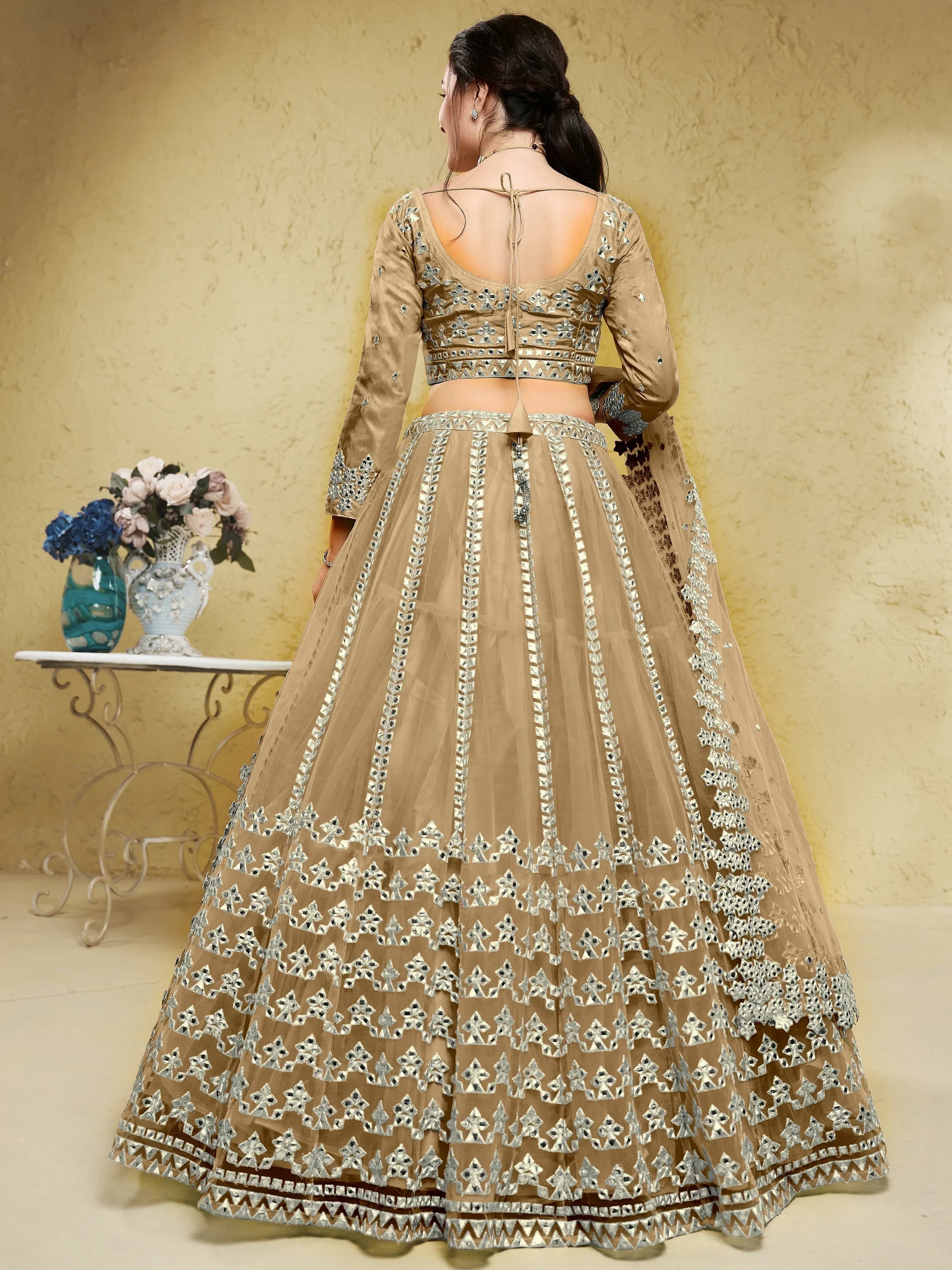 Beige Stunning Foil Work Net Wedding Lehenga Choli With Dupatta