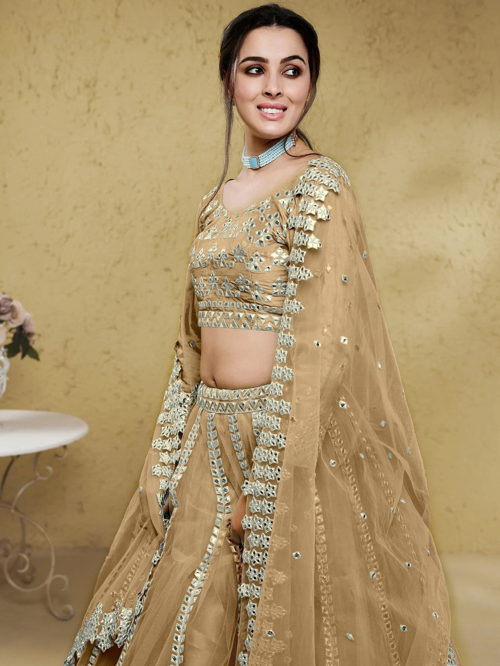 Beige Stunning Foil Work Net Wedding Lehenga Choli With Dupatta