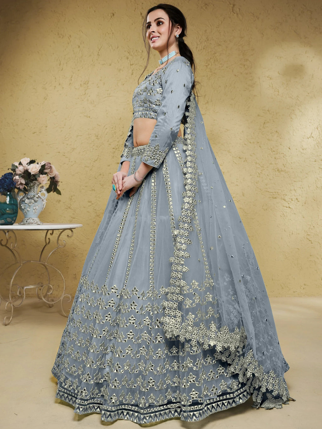 Grey Stunning Foil Work Net Wedding Lehenga Choli With Dupatta