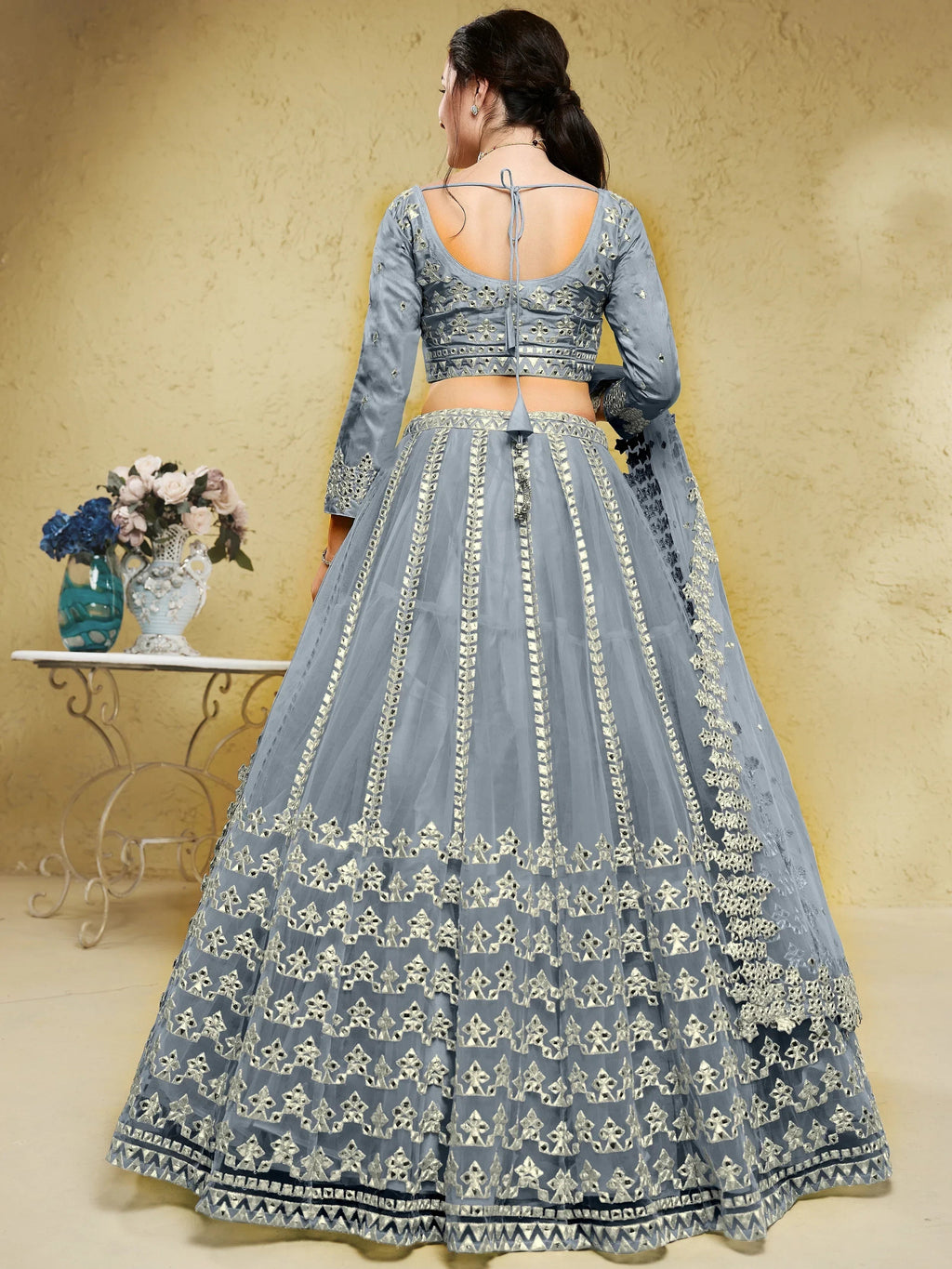 Grey Stunning Foil Work Net Wedding Lehenga Choli With Dupatta
