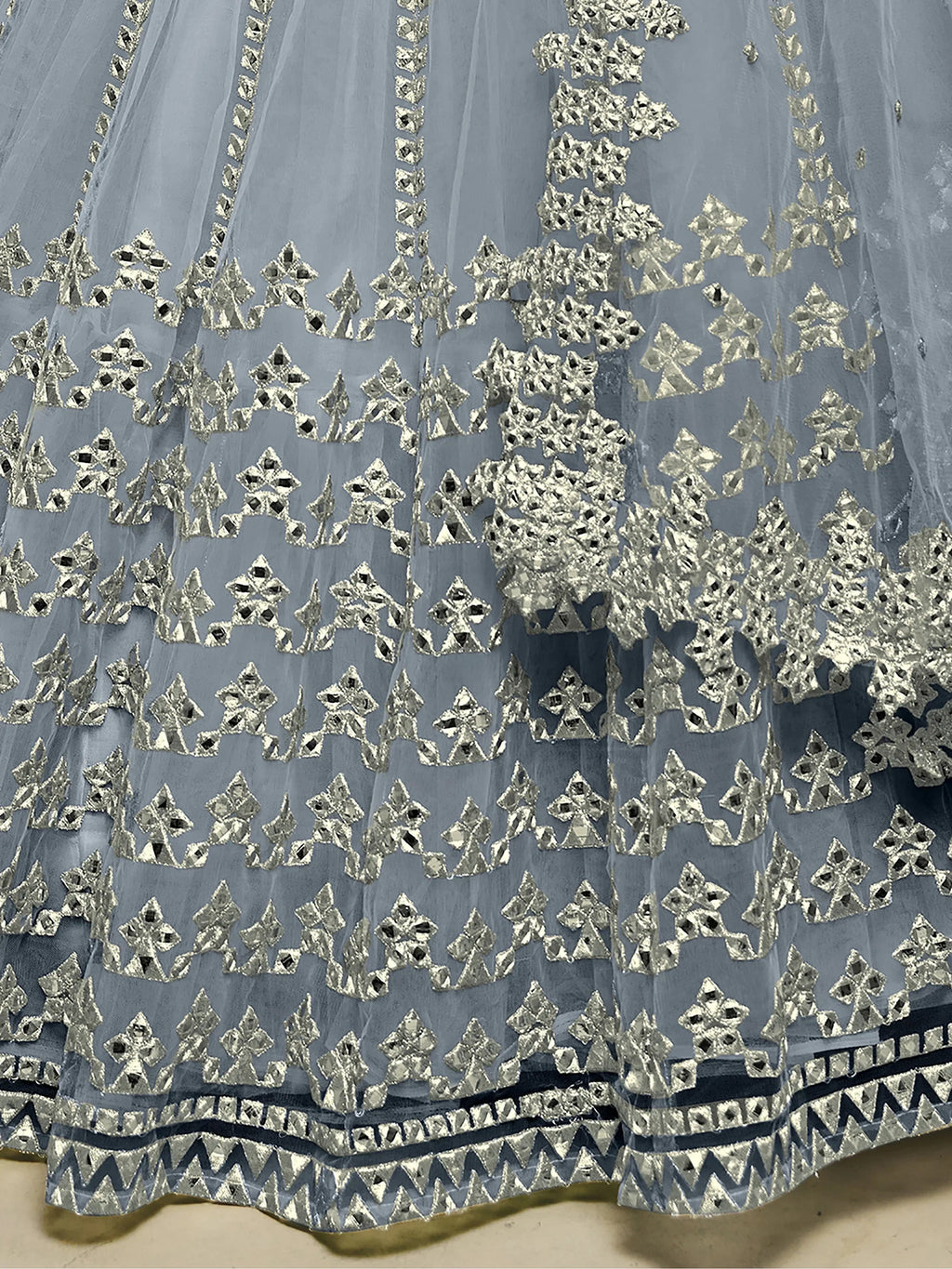 Grey Stunning Foil Work Net Wedding Lehenga Choli With Dupatta
