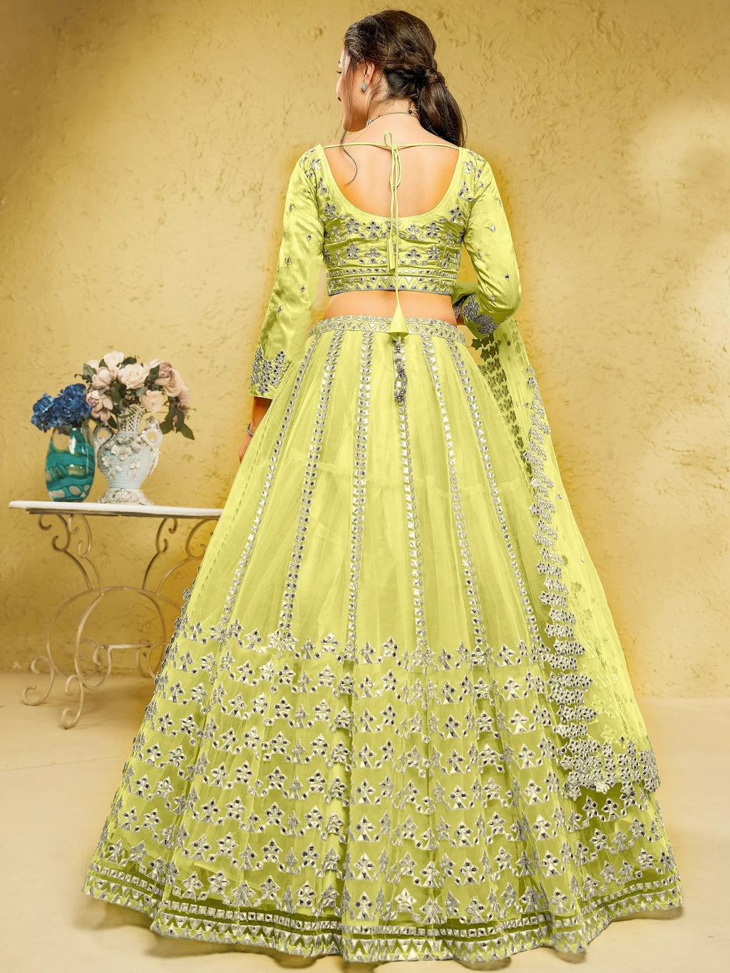 Yellow Stunning Foil Work Net Wedding Lehenga Choli With Dupatta