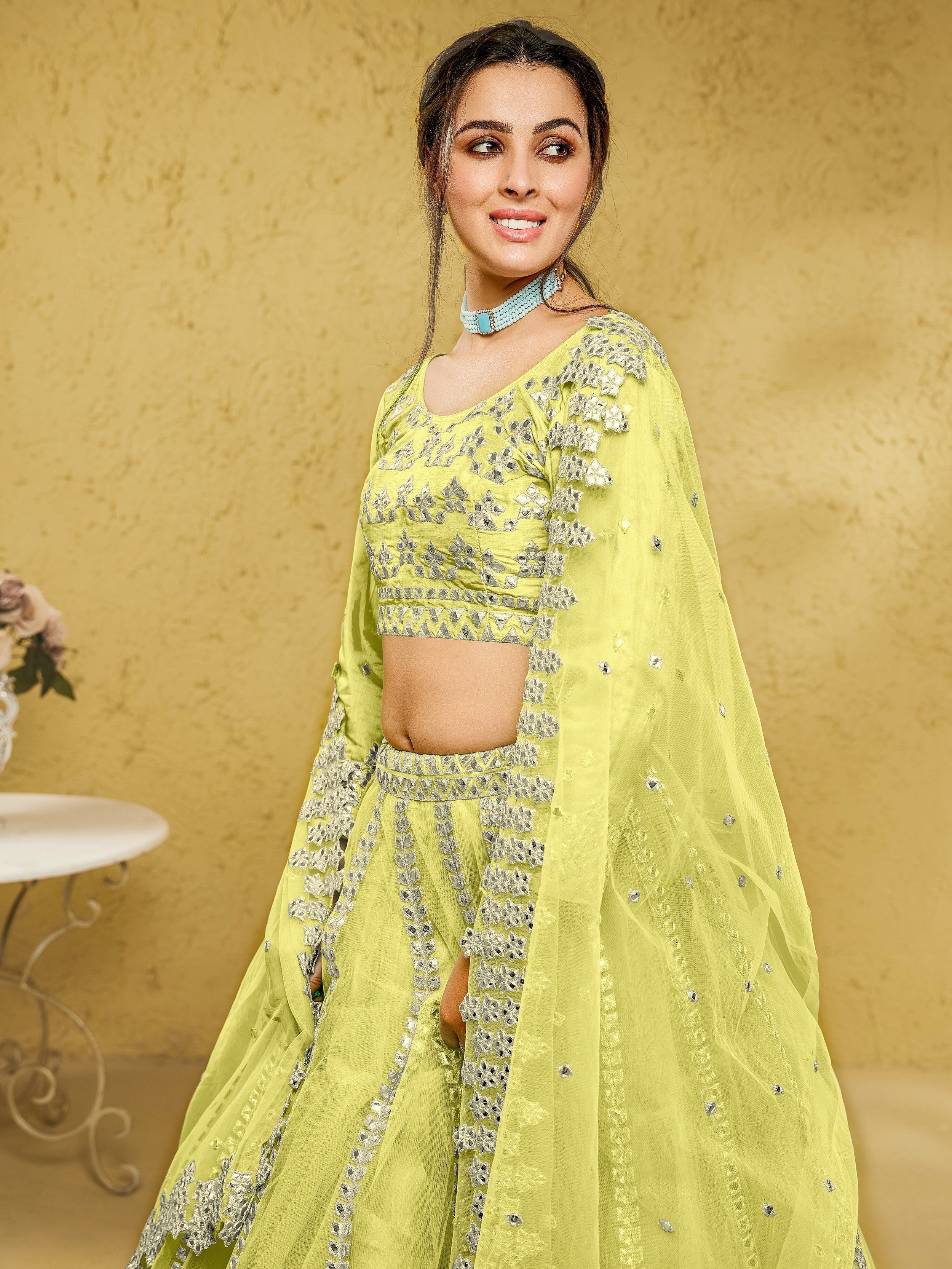 Yellow Stunning Foil Work Net Wedding Lehenga Choli With Dupatta