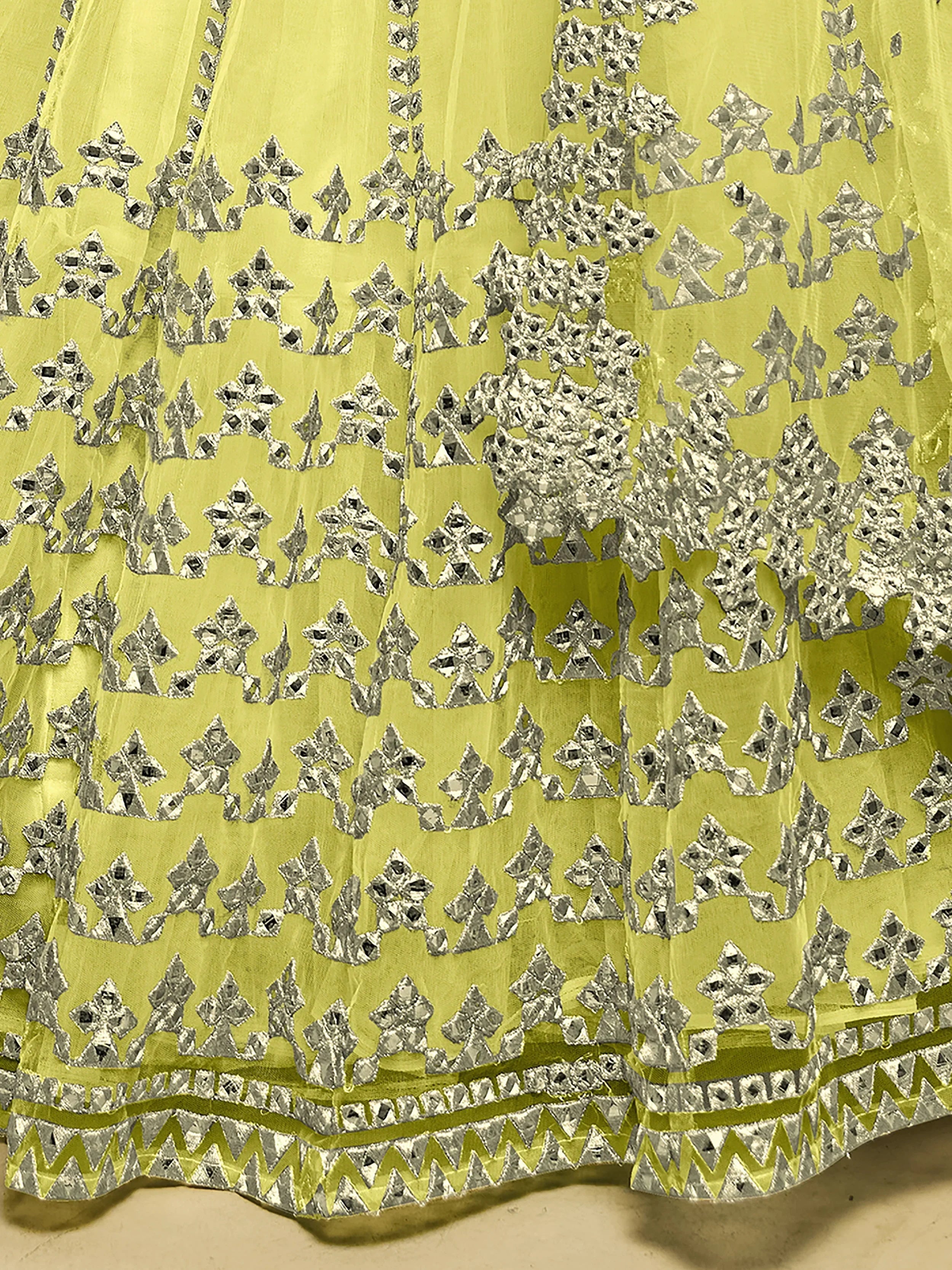 Yellow Stunning Foil Work Net Wedding Lehenga Choli With Dupatta